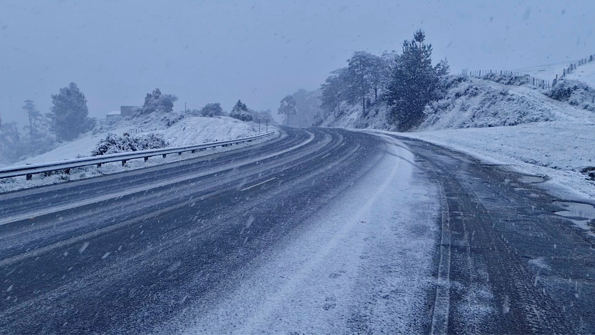 Still image shows scene of snowing in Huon Valley, near Hobart, Tasmania, Australia
