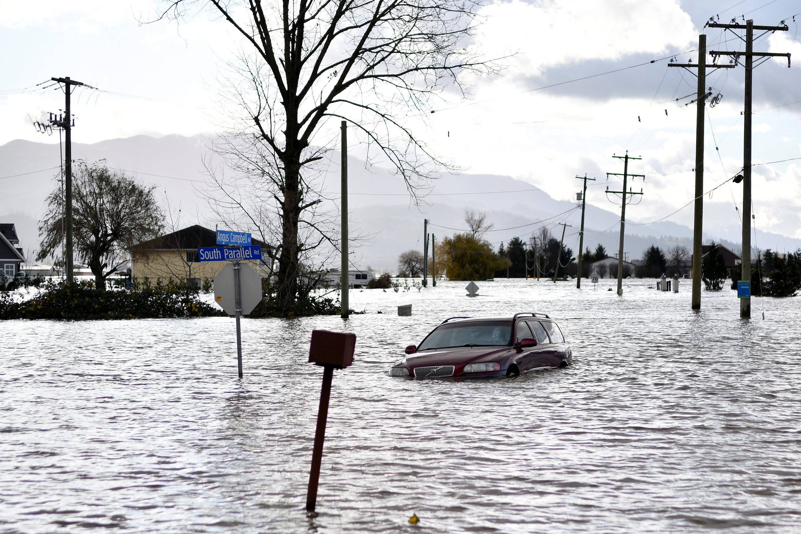 South Parallel road is submerged in flood water after rainstorms caused flooding and landslides in Abbotsford, British Columbia, Canada November 16, 2021.  REUTERS/Jennifer Gauthier