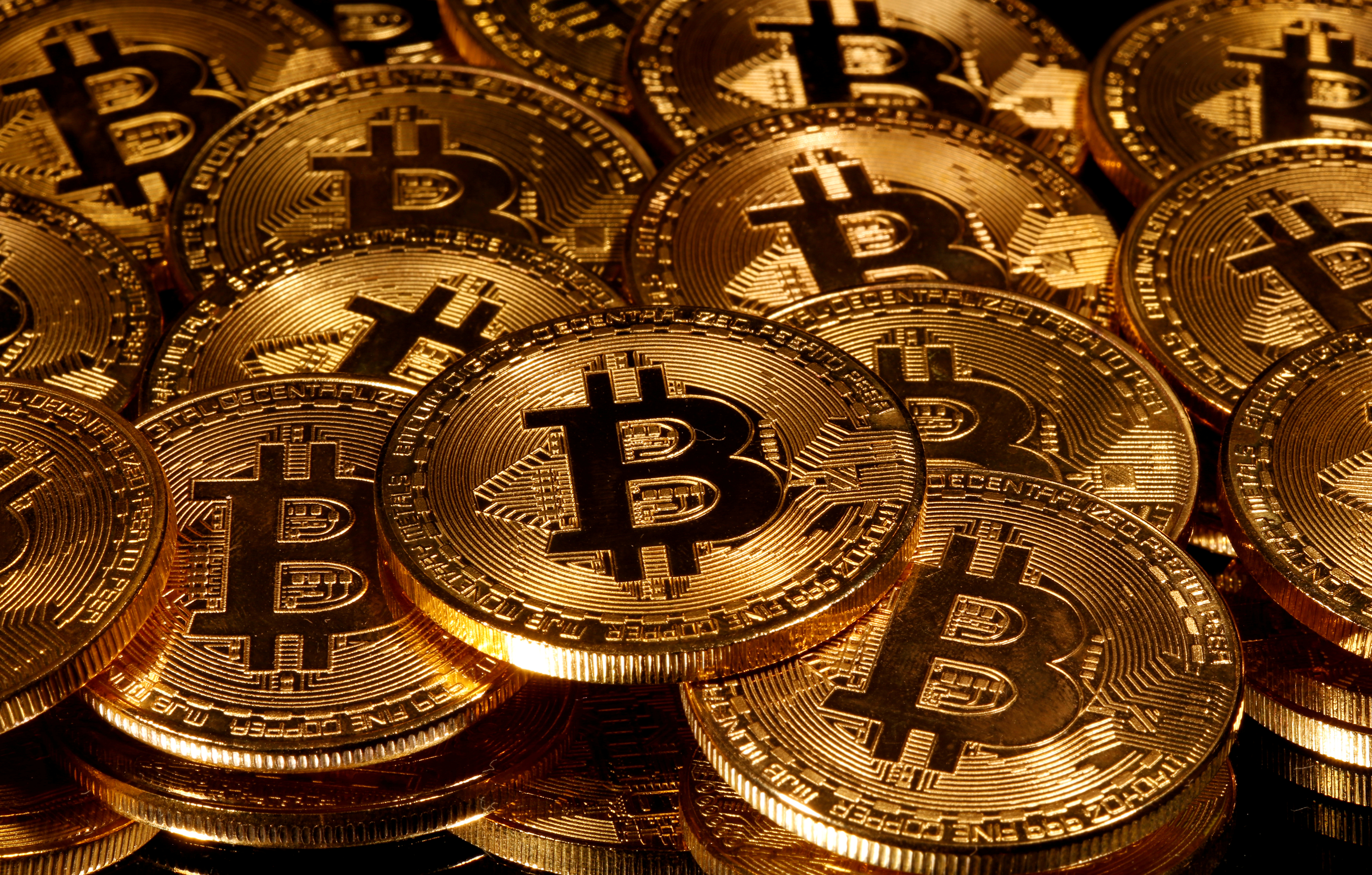 FILE PHOTO: Representations of virtual currency Bitcoin are seen in this picture illustration taken taken March 13, 2020. REUTERS/Dado Ruvic/Illustration//File Photo