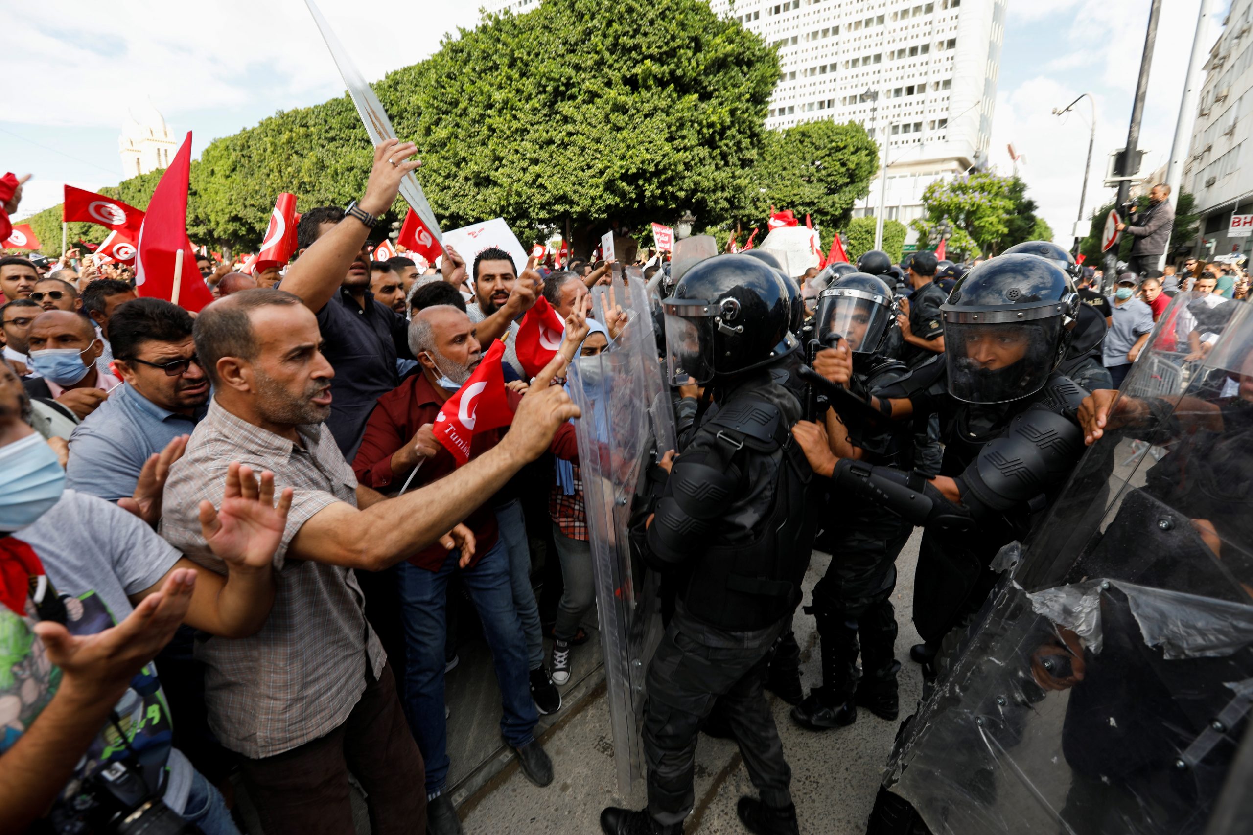 Demonstrators clash with police during a protest against Tunisian President Kais Saied's seizure of governing powers, in Tunis, Tunisia, October 10, 2021. REUTERS/Zoubeir Souissi