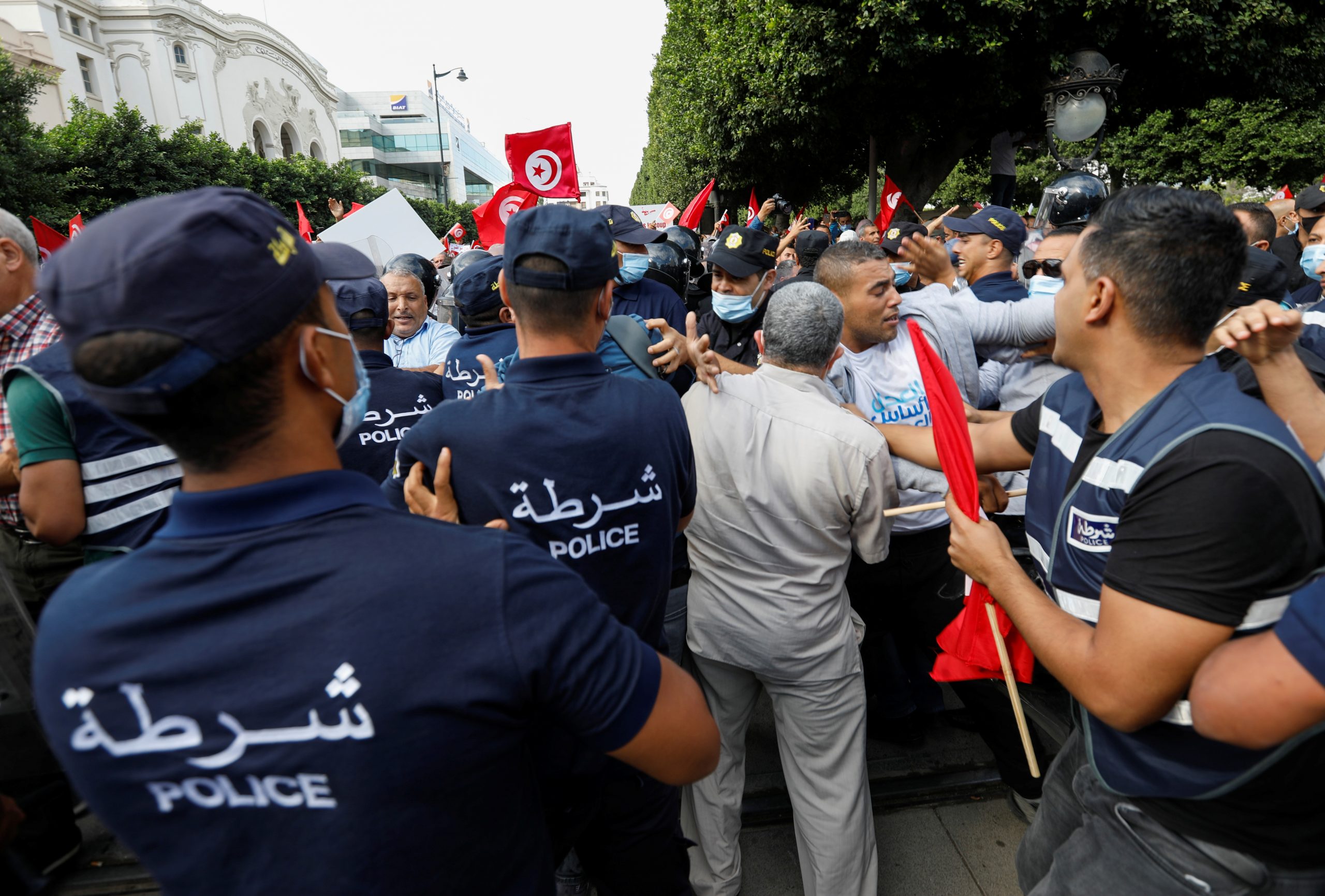 Demonstrators clash with police during a protest against Tunisian President Kais Saied's seizure of governing powers, in Tunis, Tunisia, October 10, 2021. REUTERS/Zoubeir Souissi