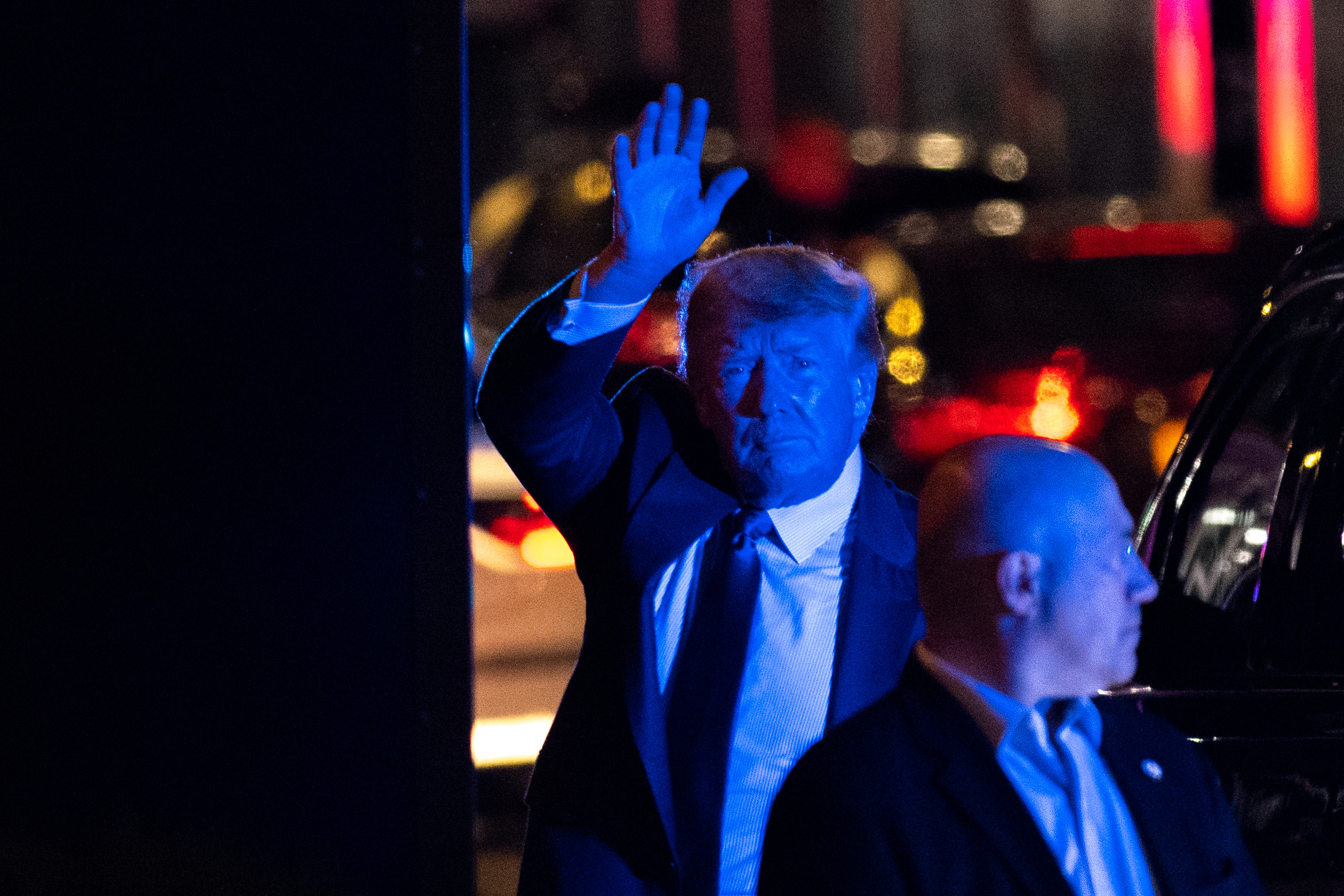 Former U.S. President Donald Trump acknowledges people outside Trump Tower in the Manhattan borough of New York City, New York, U.S.,October 17, 2021.  REUTERS/Jeenah Moon