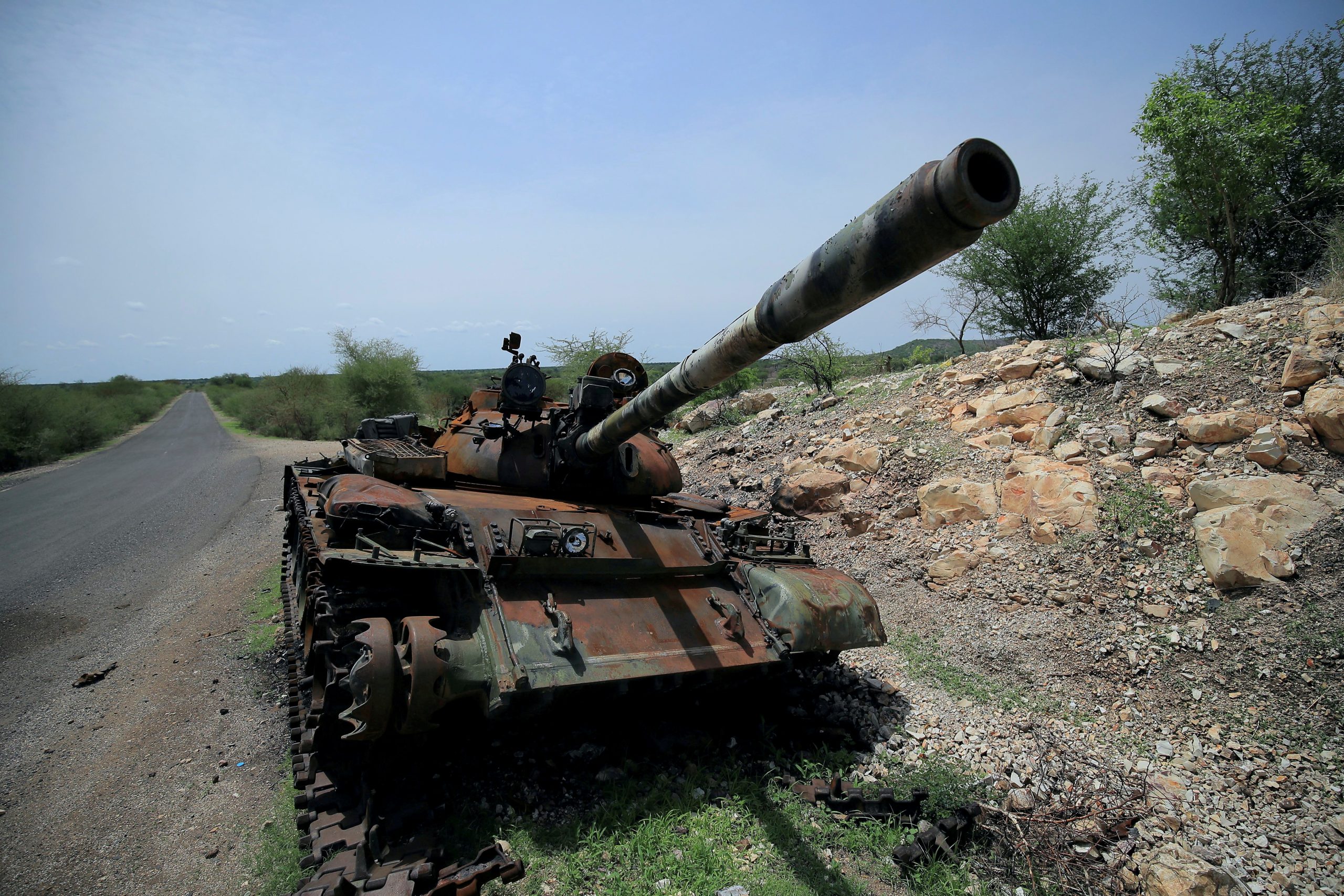 FILE PHOTO: A tank damaged during the fighting between Ethiopia's National Defense Force (ENDF) and Tigray Special Forces stands on the outskirts of Humera town in Ethiopia July 1, 2021.  REUTERS/Stringer/File Photo
