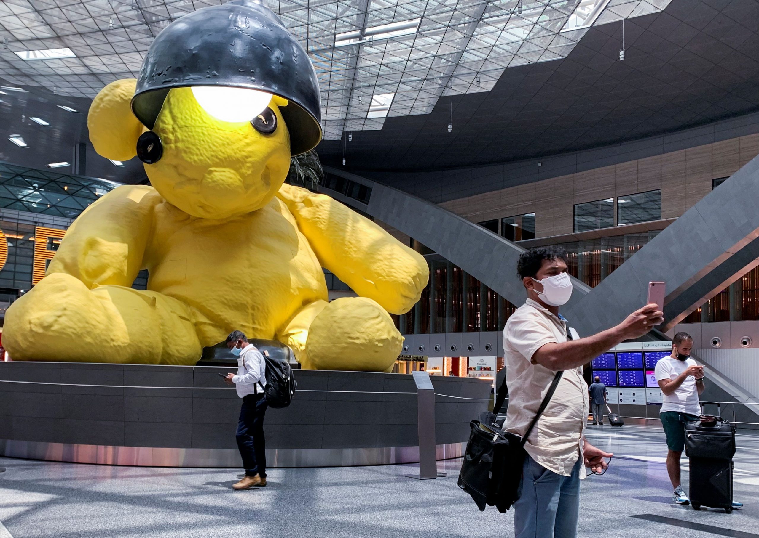 1629026628-2021-08-10T114429Z_1853440952_RC2B2P9BZ9Y4_RTRMADP_3_QATAR-ECONOMY-AIRPORT-scaled.jpg