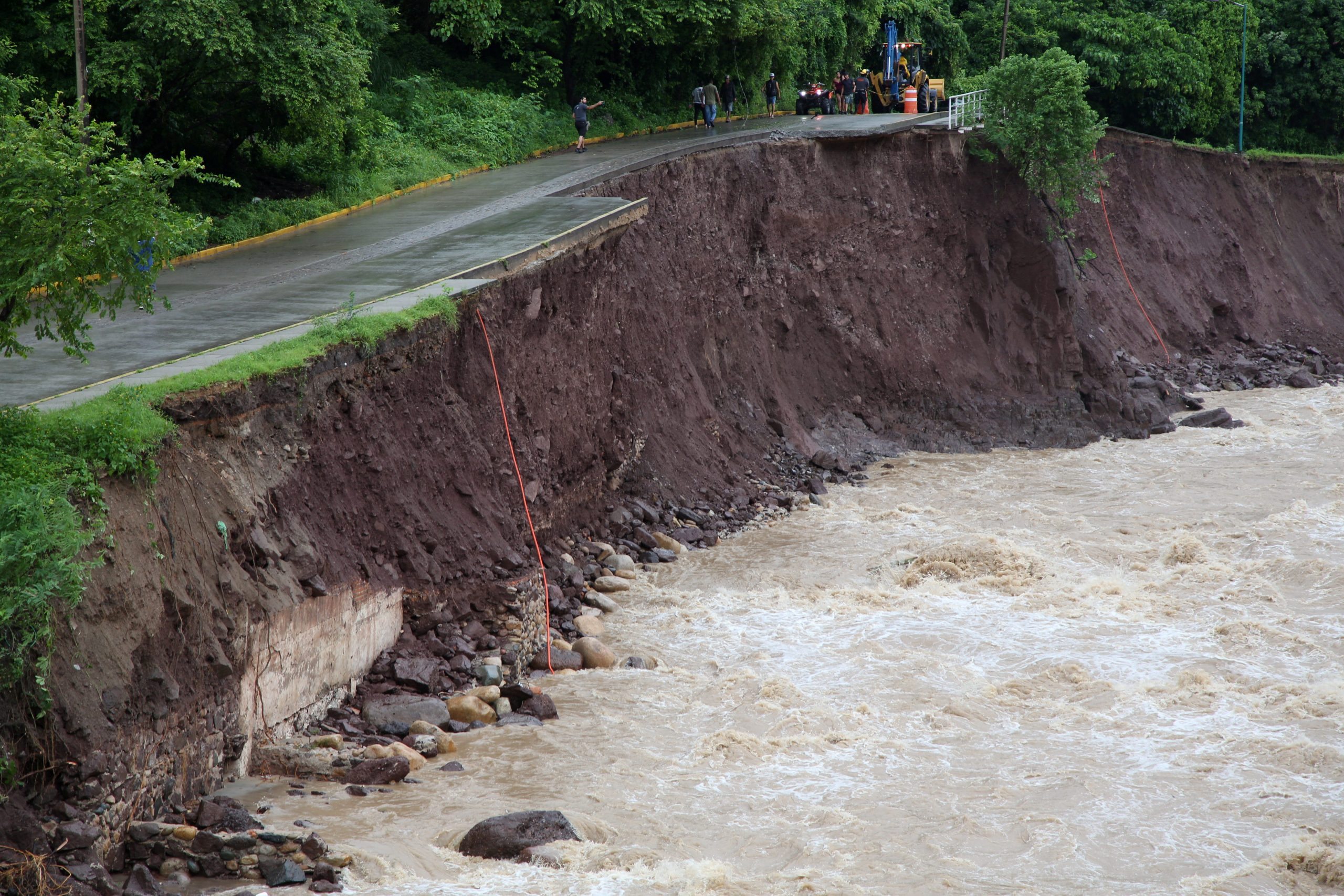 A view shows swollen Cuale river waters after that Hurricane Nora pounds Mexico coast with heavy rains and strong winds in Puerto Vallarta, in Jalisco state, Mexico August 29, 2021. REUTERS/Alfonso Lepe NO RESALES. NO ARCHIVES
