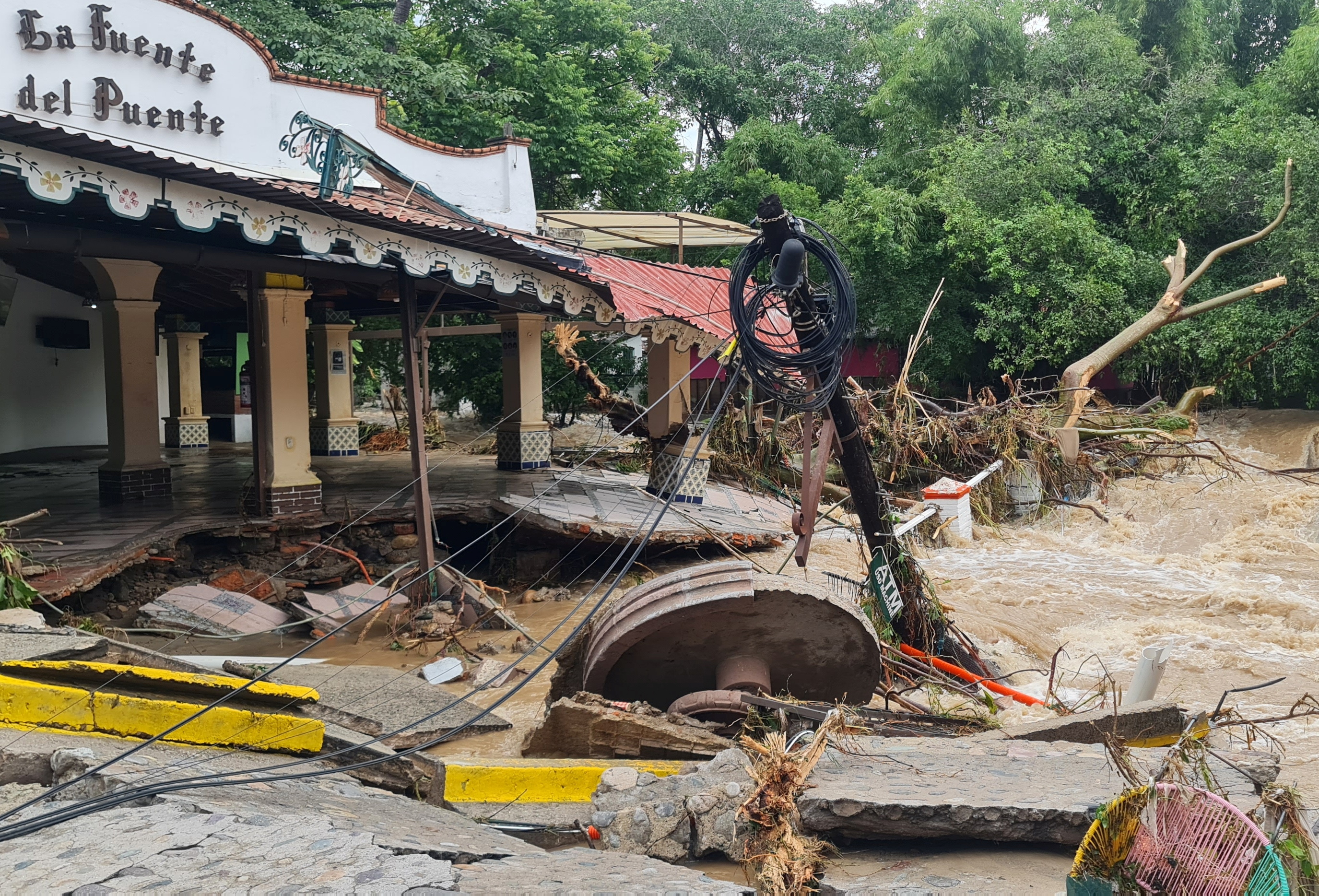 A general view shows a flooded street after Hurricane Nora pounds Mexico coast with heavy rains and strong winds in Puerto Vallarta, in Jalisco state, Mexico August 29, 2021. REUTERS/Alfonso Lepe NO RESALES. NO ARCHIVES