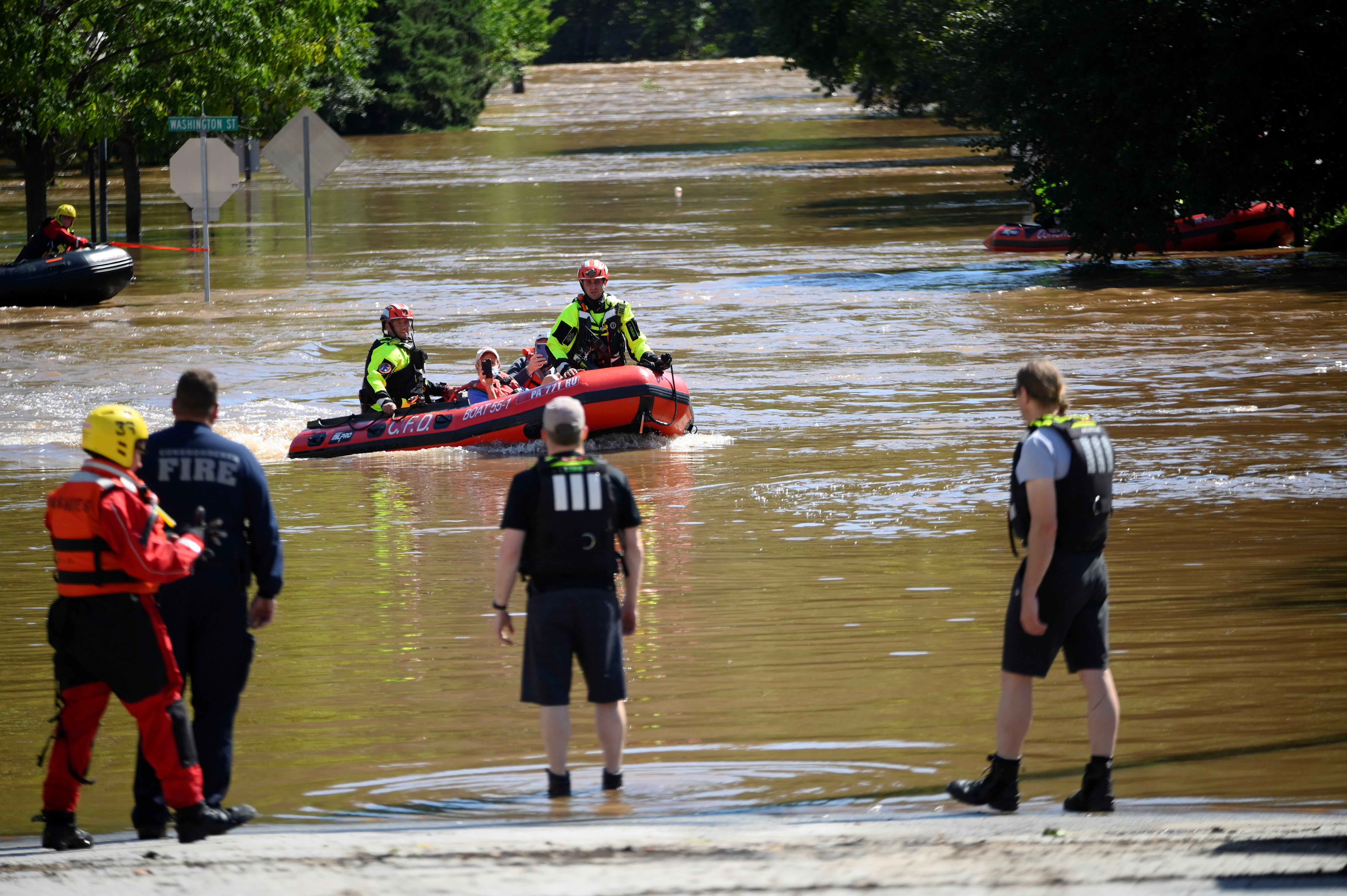 Emergency personnel conduct rescues for people trapped by floodwaters caused by the remnants of Tropical Storm Ida in Conshohocken, Pennsylvania, U.S., September 2, 2021. REUTERS/Bastiaan Slabbers