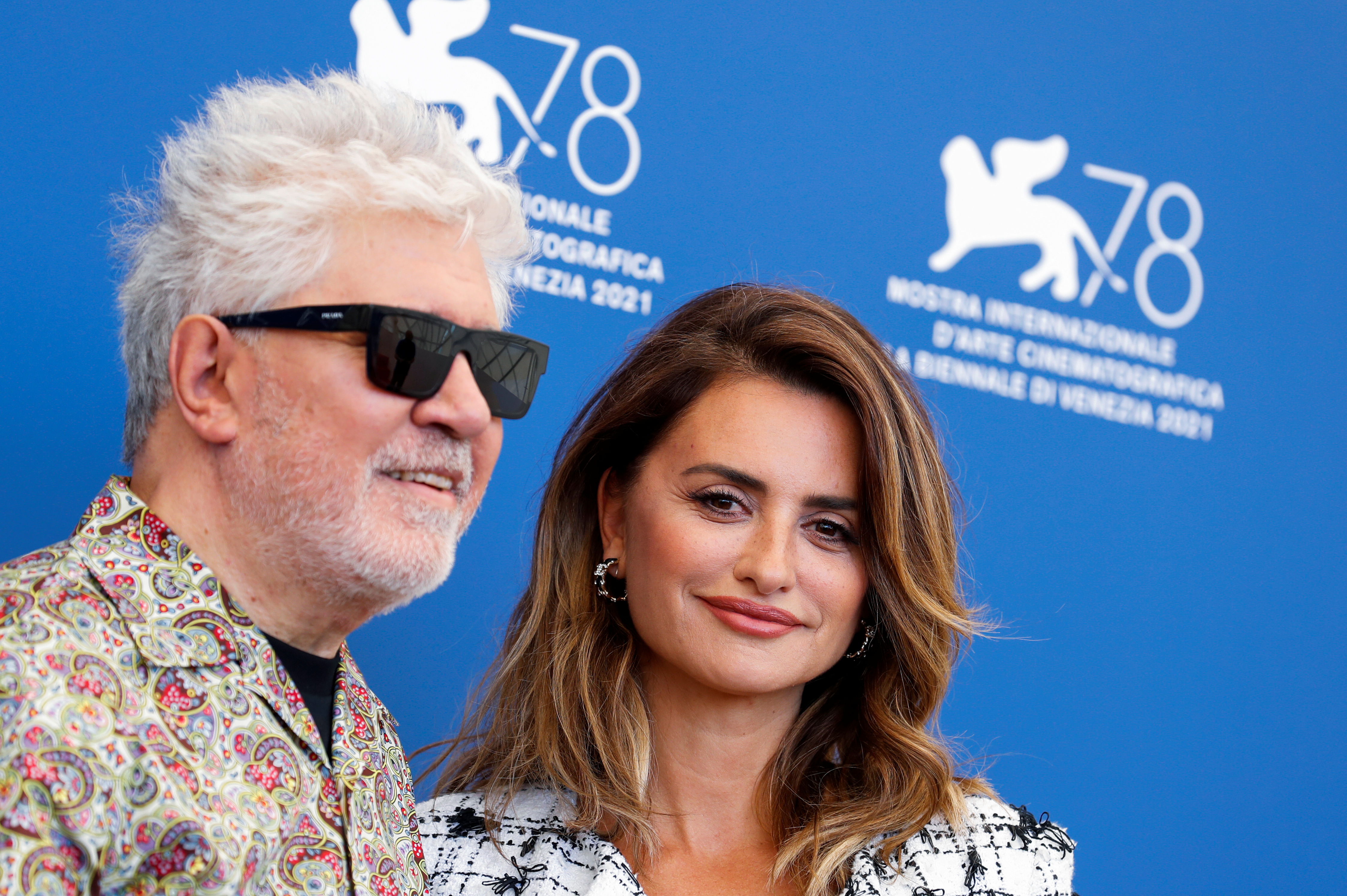 The 78th Venice Film Festival - Photo call for "Parallel Mothers" in competition - Venice, Italy, September 1, 2021 - Actor Penelope Cruz poses for a photo with Director Pedro Almodovar. REUTERS/Yara Nardi