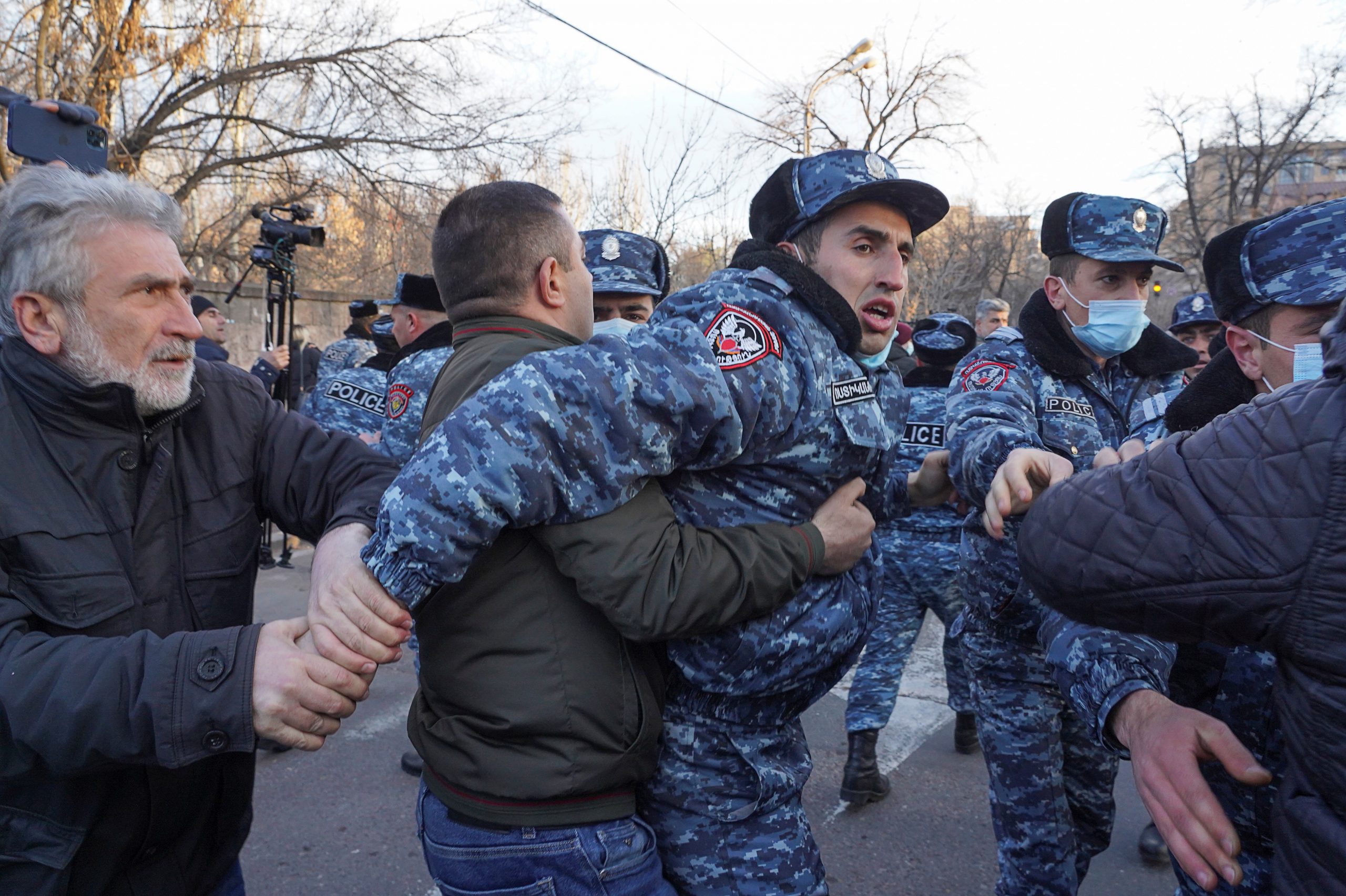 Armenian police officers block the way during an opposition rally to demand the resignation of Prime Minister Nikol Pashinyan in Yerevan, Armenia March 9, 2021. REUTERS/Artem Mikryukov