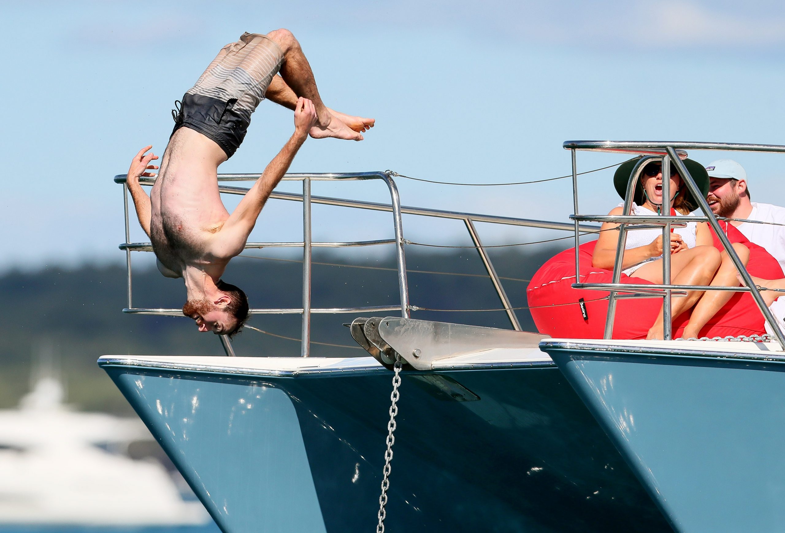 Sailing - 36th America's Cup - Waitemata Harbour, Auckland, New Zealand - March 14, 2021  Fans are seen on a boat  before Race 7 of the America's Cup REUTERS/Simon Watts