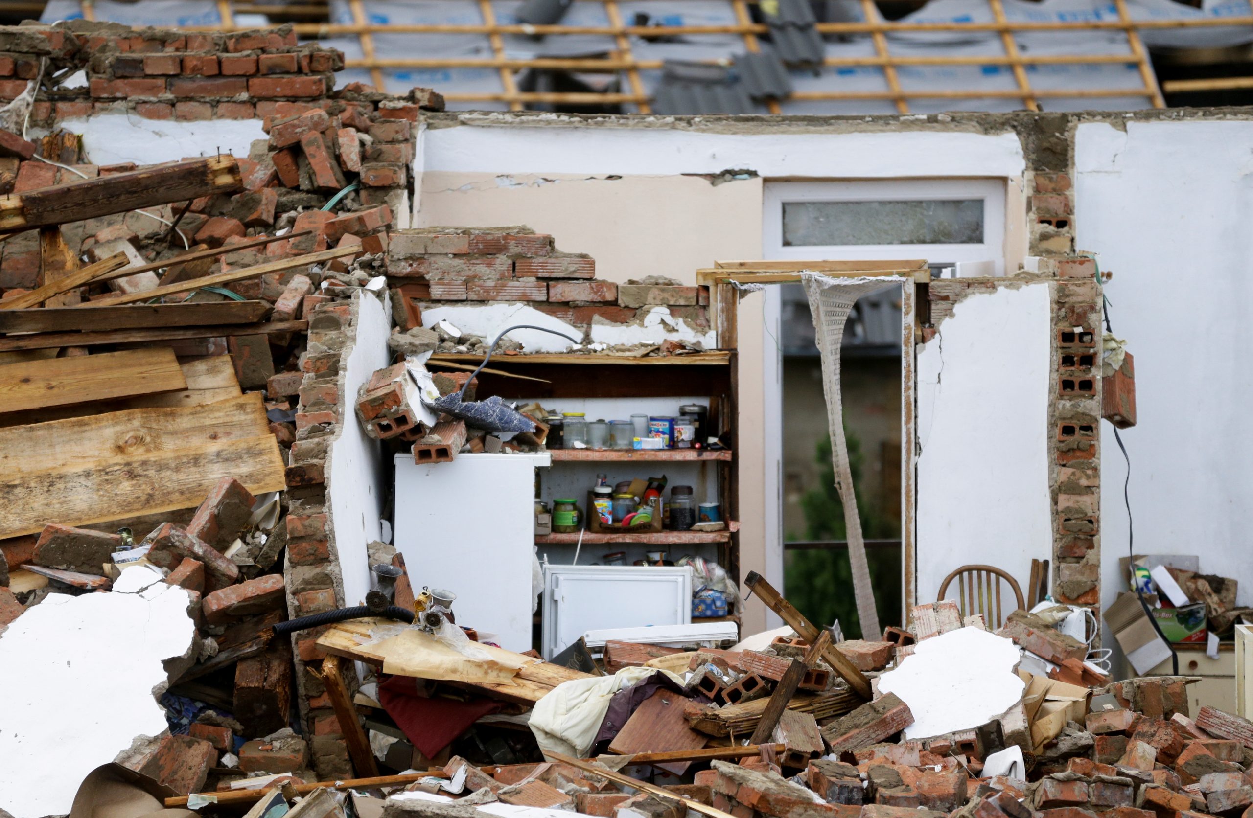 A view of a damaged house in the aftermath of a rare tornado that struck and destroyed parts of some towns, in Mikulcice village, Czech Republic, June 25, 2021. REUTERS/David W Cerny