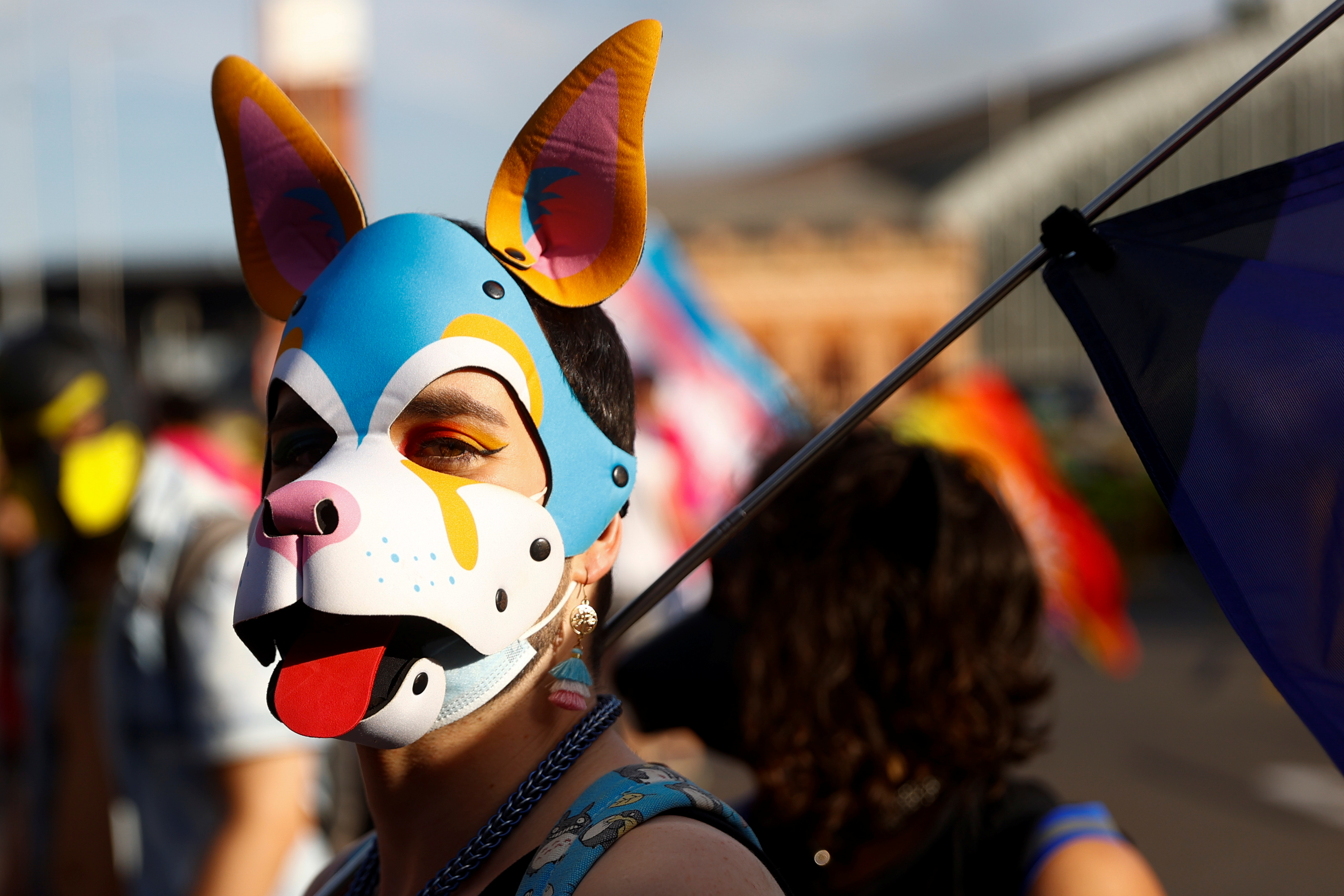 A reveller wearing a mask takes part in the Gay Pride parade in Madrid, Spain, July 3, 2021. REUTERS/Sergio Perez