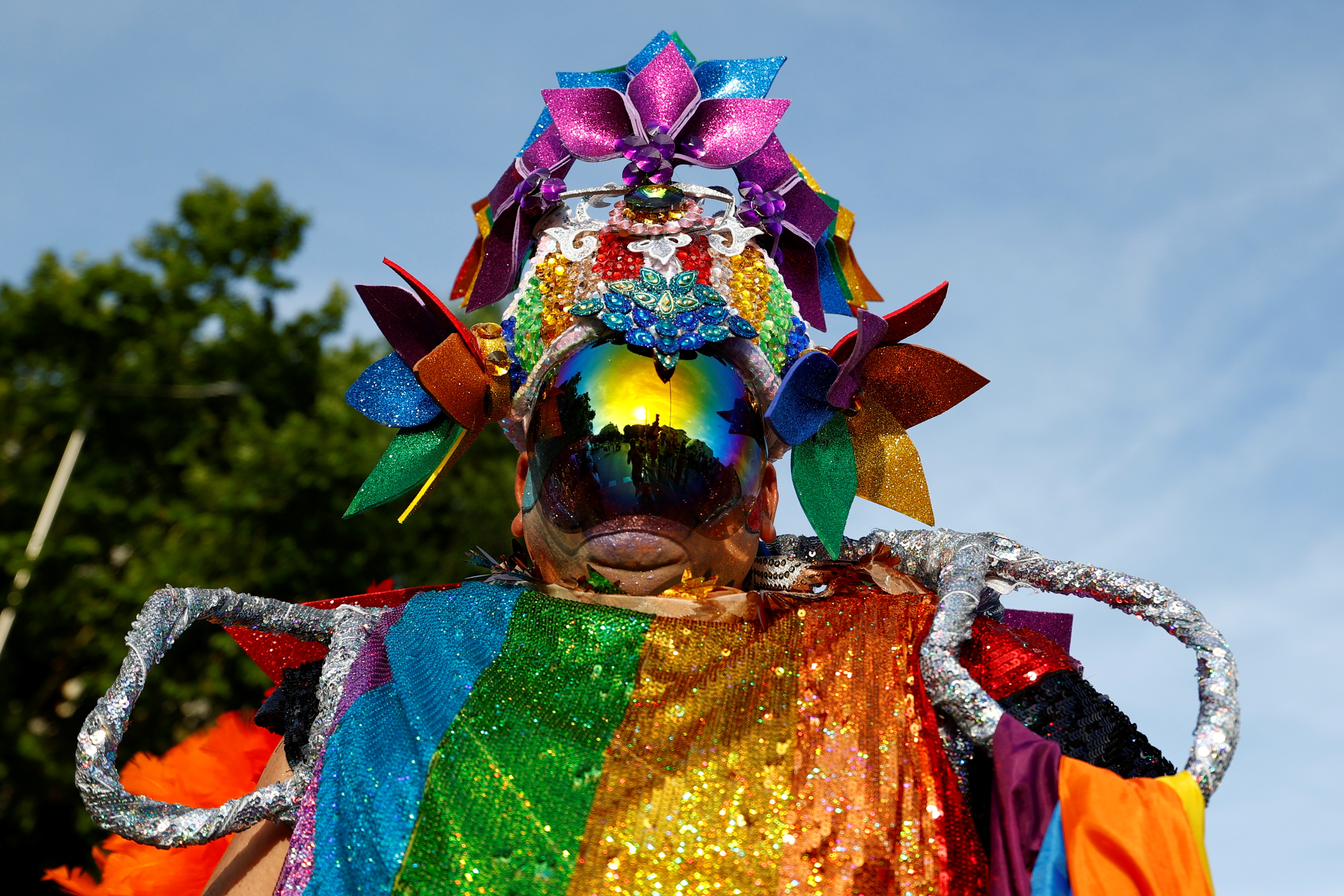 A reveller wearing a costume takes part in the Gay Pride parade in Madrid, Spain, July 3, 2021. REUTERS/Sergio Perez