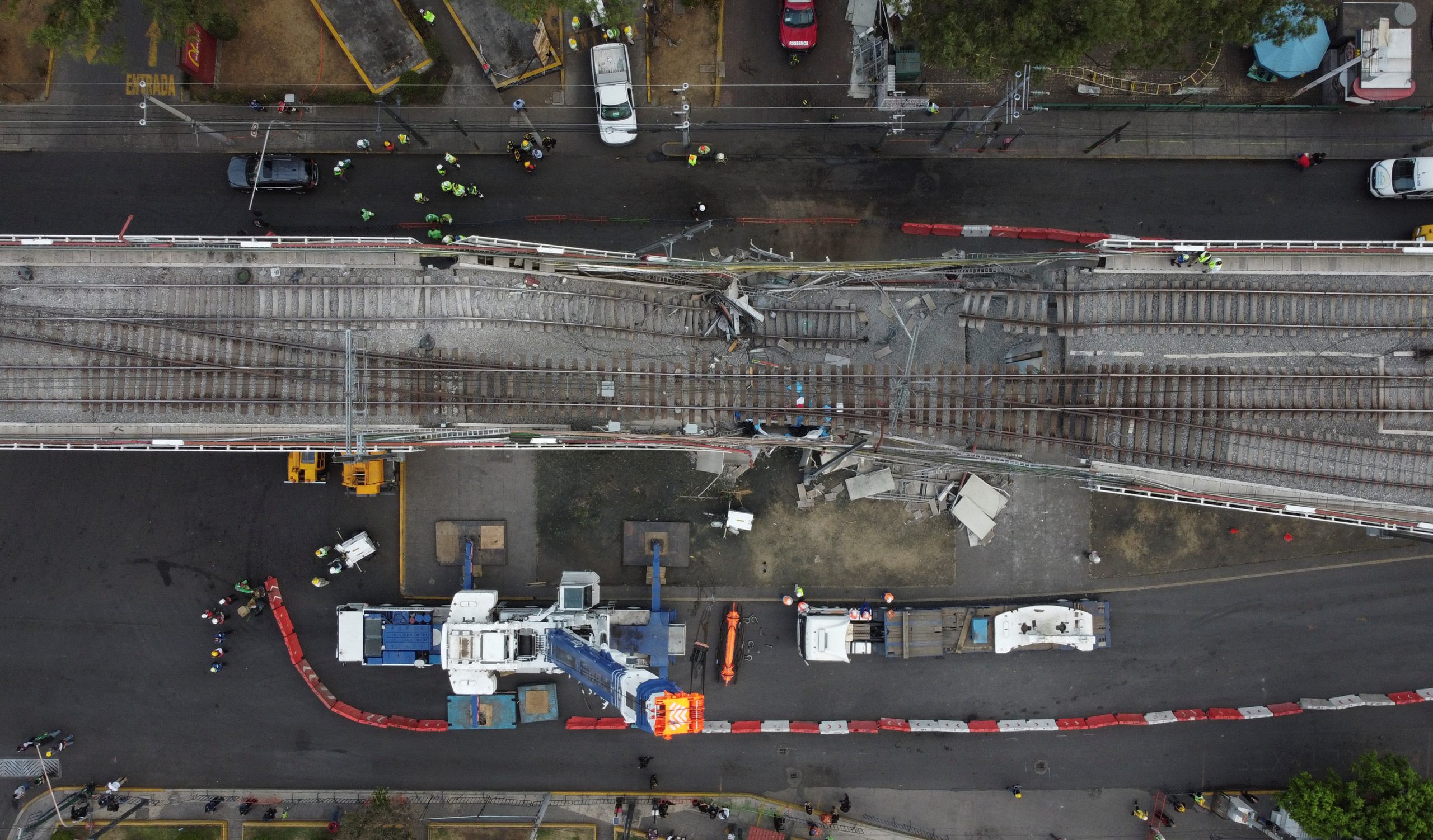 A general view of the damage caused after a railway overpass and train collapsed onto a road in Mexico City, Mexico May 4, 2021. Picture taken with a drone. REUTERS/Carlos Jasso