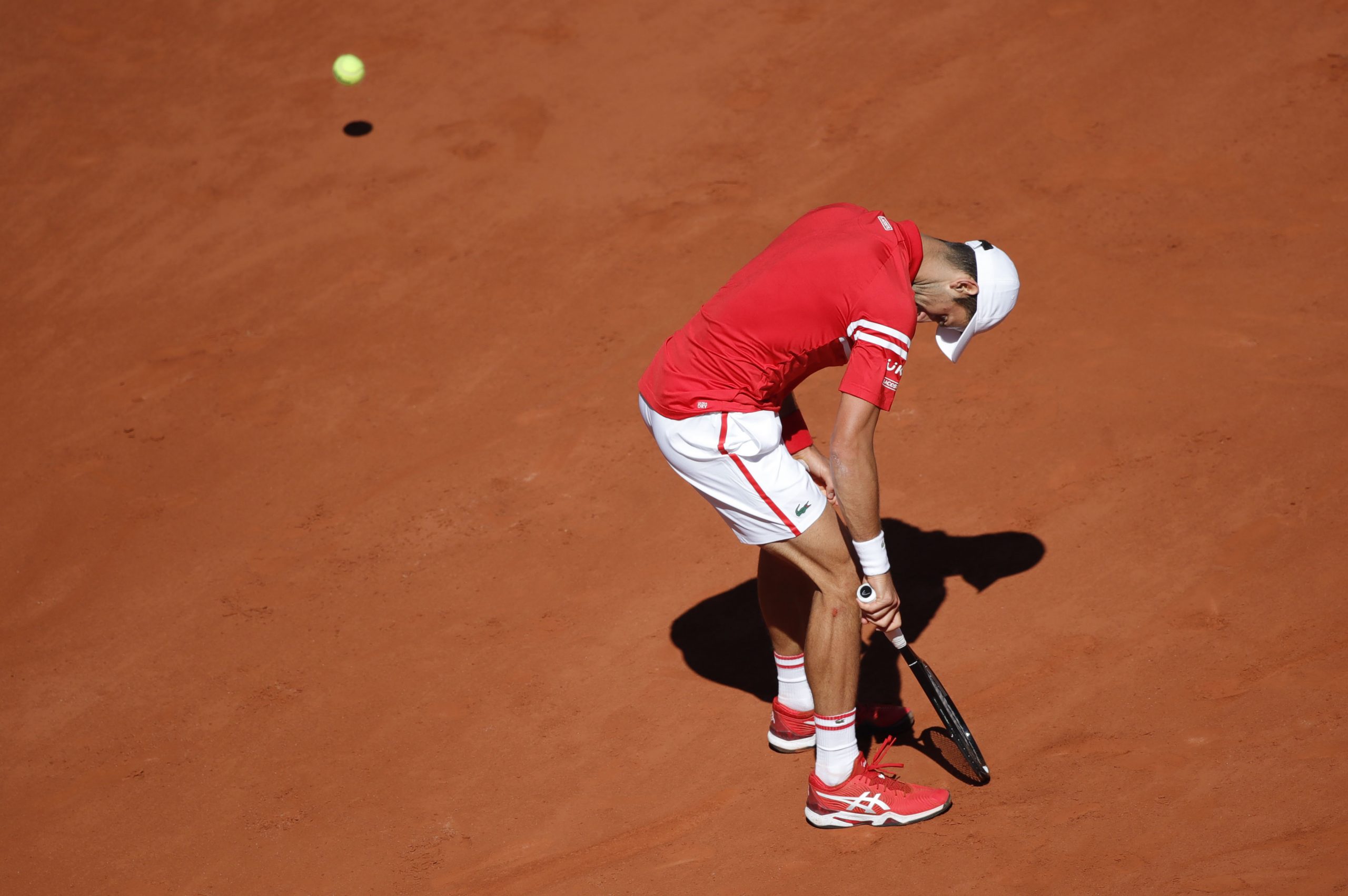 Tennis - French Open - Roland Garros, Paris, France - June 13, 2021 Serbia's Novak Djokovic reacts during the final against Greece's Stefanos Tsitsipas REUTERS/Sarah Meyssonnier