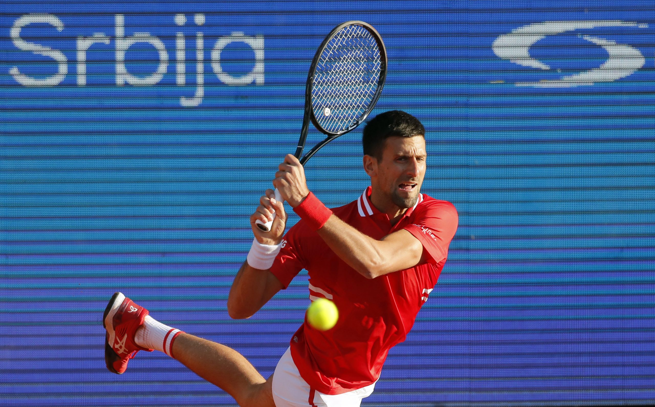 (210424) -- BELGRADE (SERBIA), April 24, 2021 (Xinhua) --   Serbia's Novak Djokovic returns to Russia's Aslan Karatsev during their ATP 250 Serbia Open semi-final singles tennis match in Belgrade, Serbia on April 24, 2021. (Xinhua/Predrag Milosavljevic)