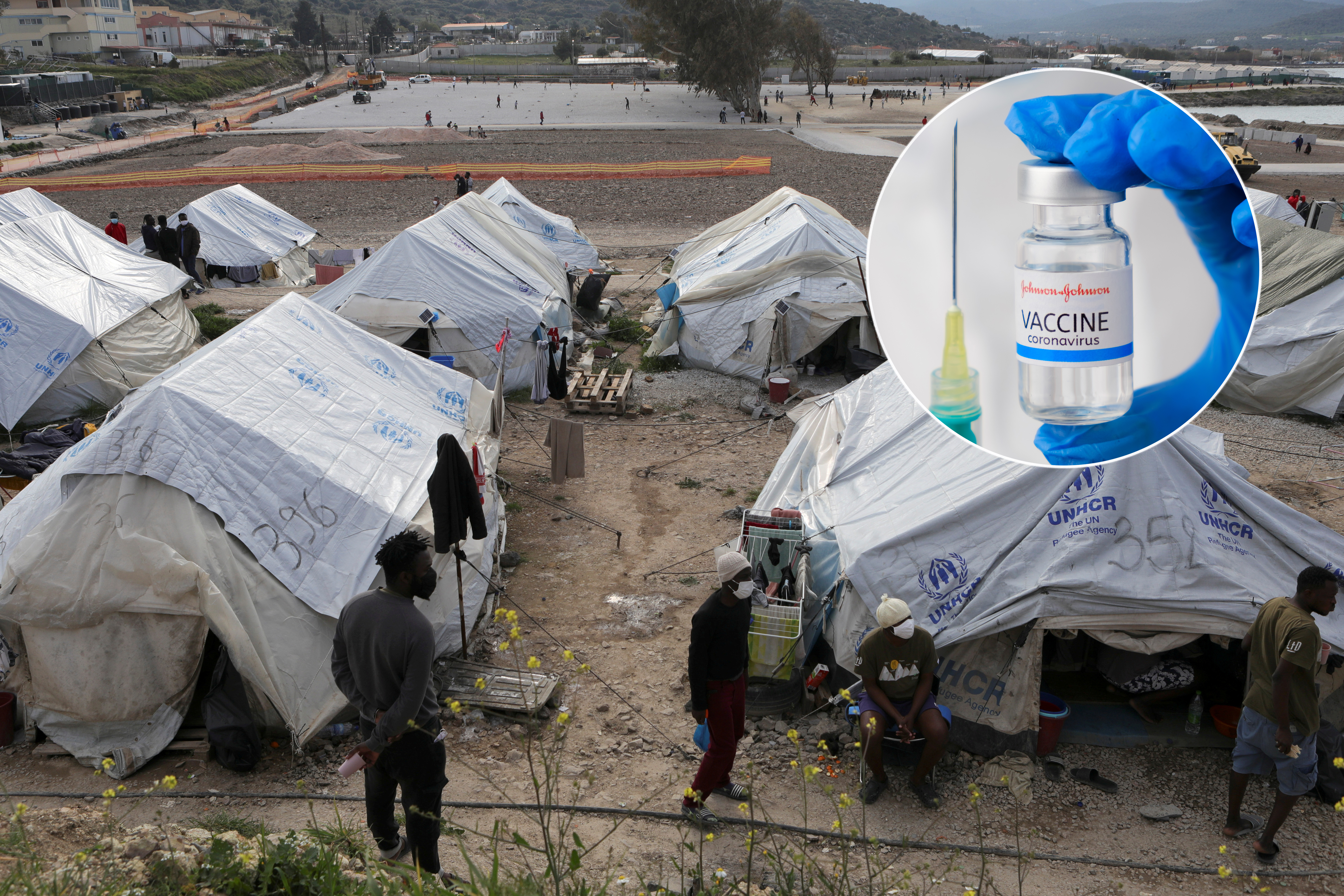 FILE PHOTO: Refugees and migrants stand next to tents in the Mavrovouni camp on the island of Lesbos, Greece, March 29, 2021. REUTERS/Elias Marcou/File Photo