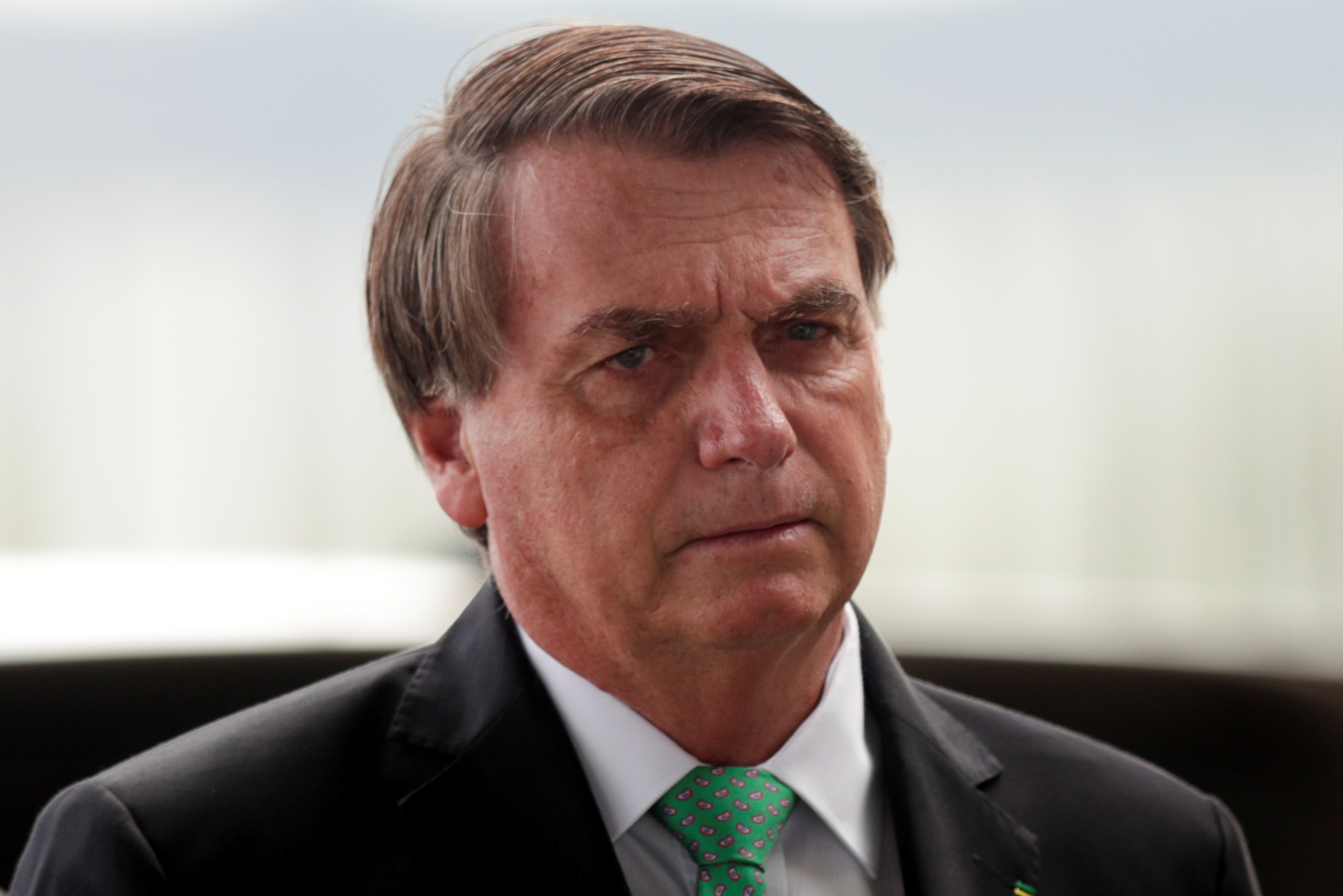 Brazil's President Jair Bolsonaro leaves Alvorada Palace, amid the coronavirus disease (COVID-19) outbreak in Brasilia, Brazil, March 9, 2021. REUTERS/Ueslei Marcelino