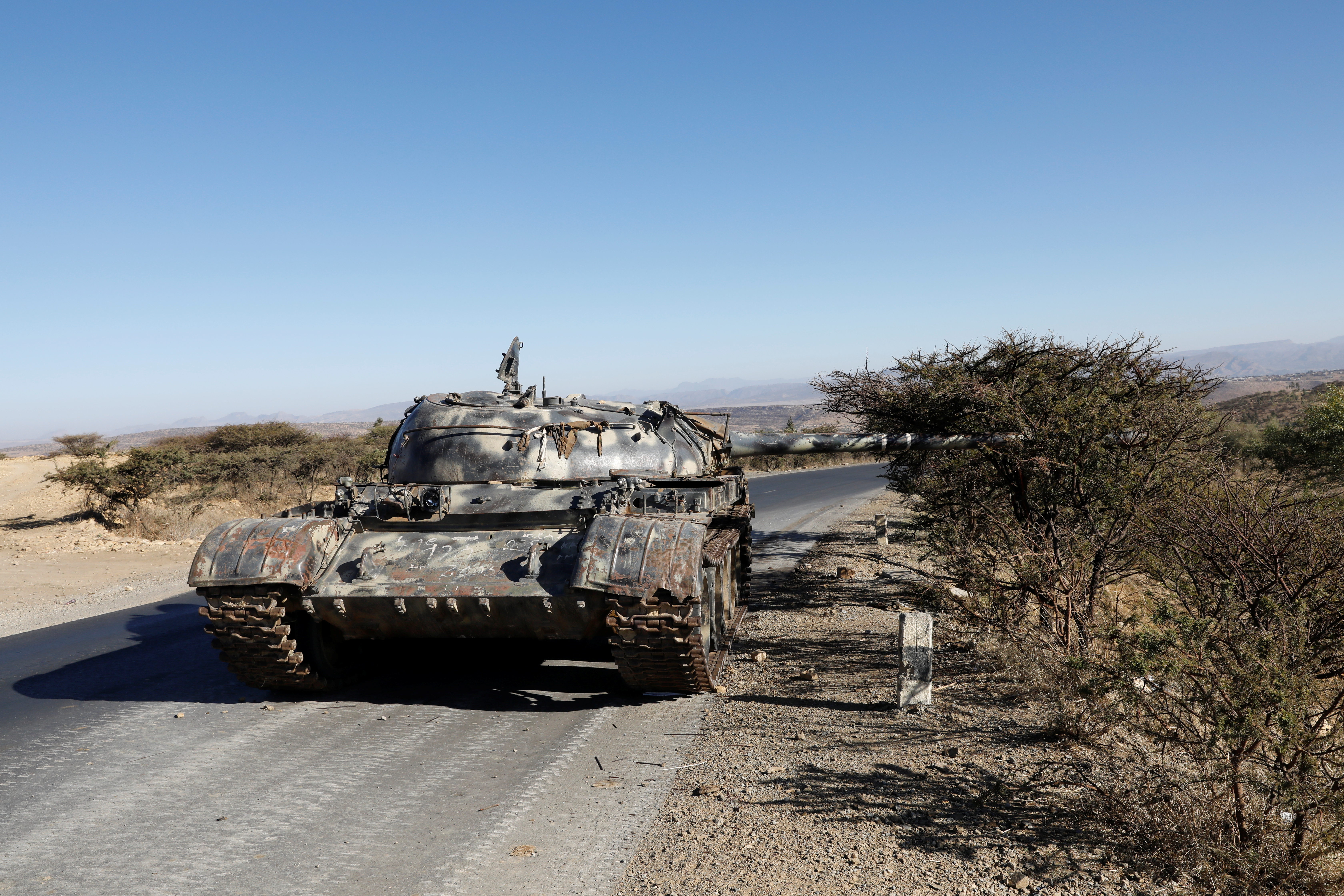 A damaged Eritrean military tank is seen near the town of Wikro, Ethiopia, March 14, 2021.Picture taken March 14, 2021.REUTERS/Baz Ratner