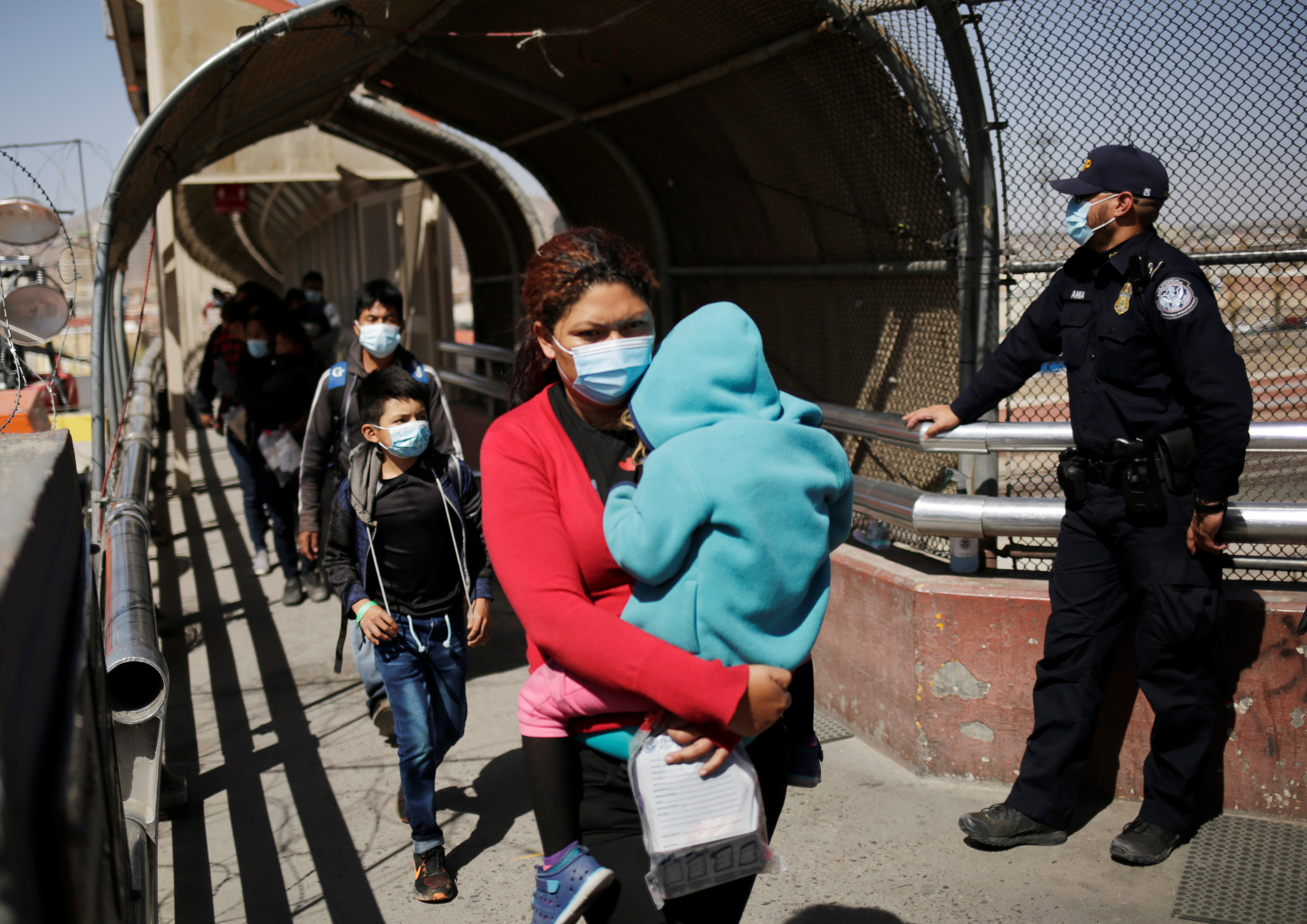 Asylum-seeking migrants from Central America, who were airlifted from Brownsville to El Paso, Texas, and deported from the U.S., in Ciudad Juarez