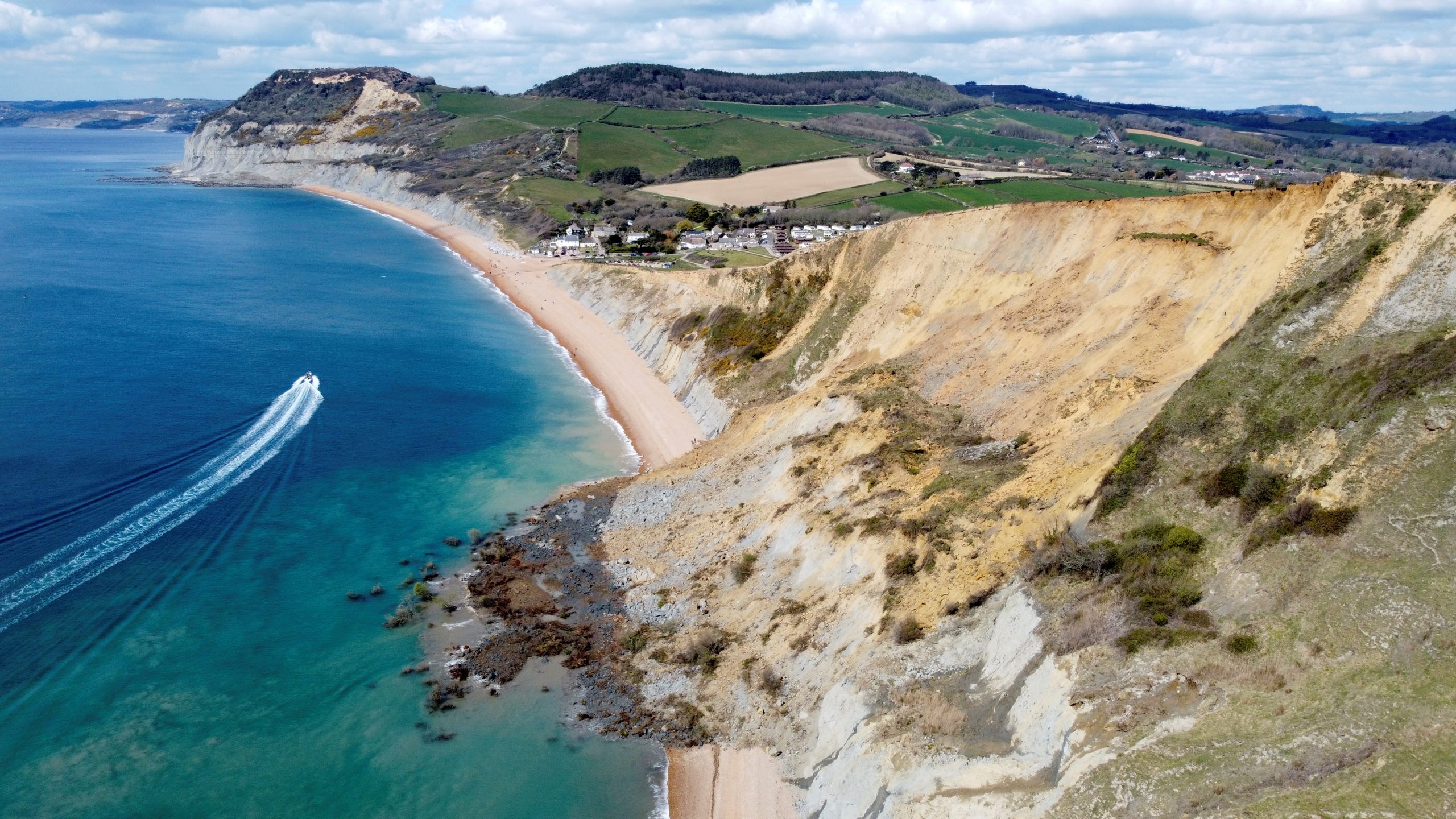Rockfall is seen on a beach after a cliff collapsed near the village of Seatown, Dorset, Britain, April 16, 2021. Picture taken with a drone. REUTERS/Carl Recine     TPX IMAGES OF THE DAY