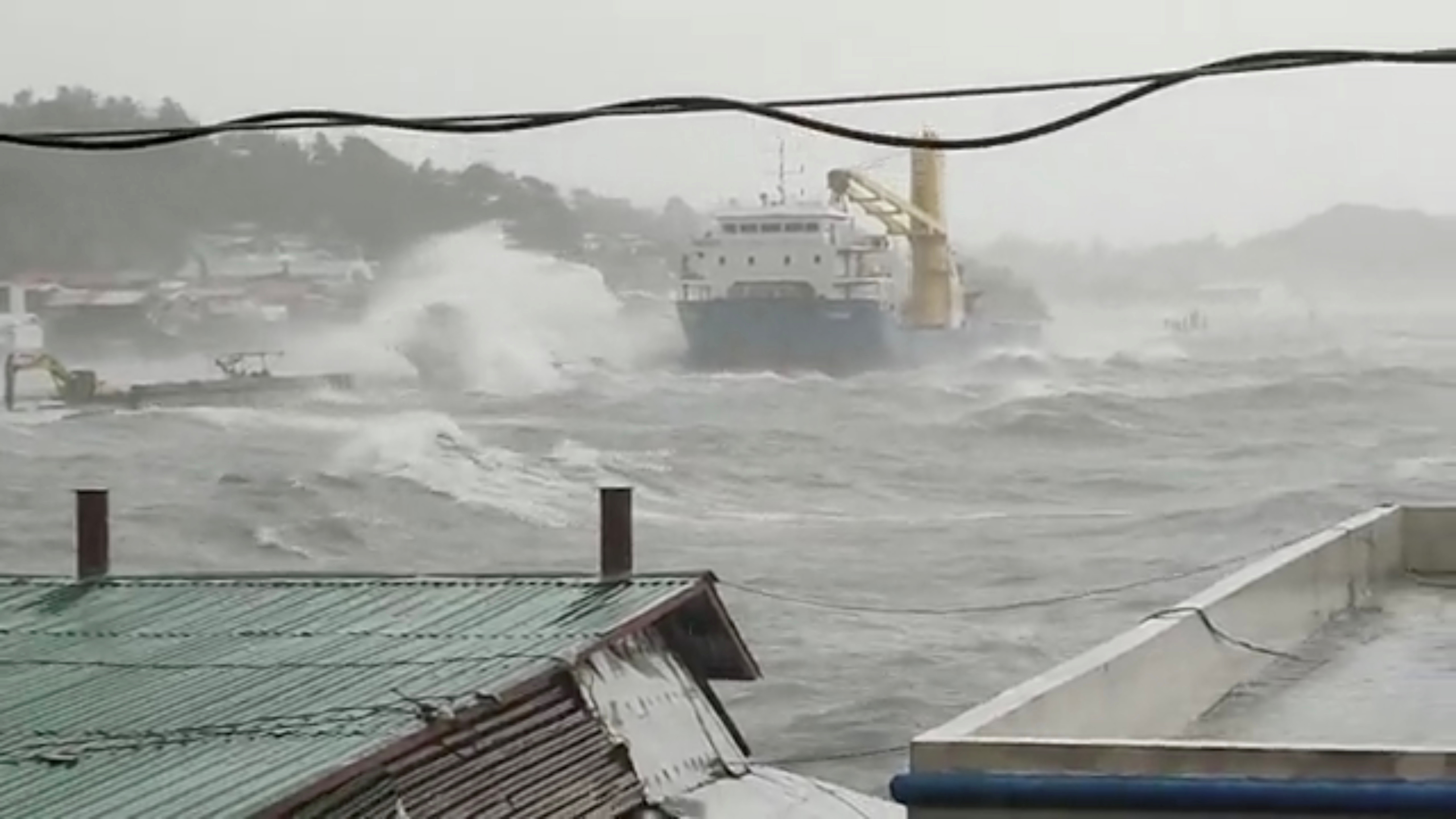 Waves crash the shore as Super Typhoon Surigae moves close to the Philippines in the province of Catbalogan