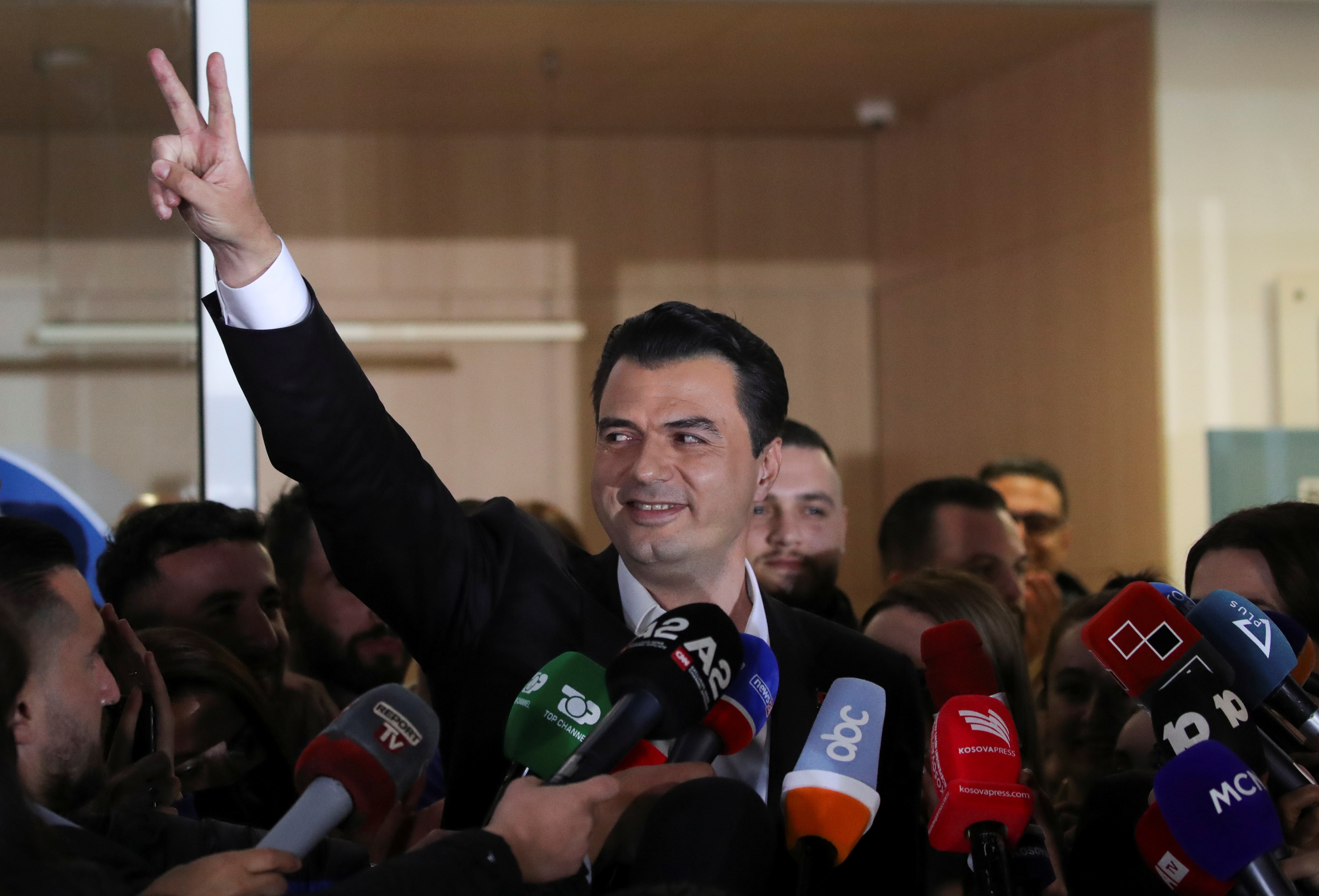Albania's Democratic Party leader Lulzim Basha reacts after exit polls were announced in the parliamentary election, in Tirana, Albania April 25, 2021. REUTERS/Florion Goga