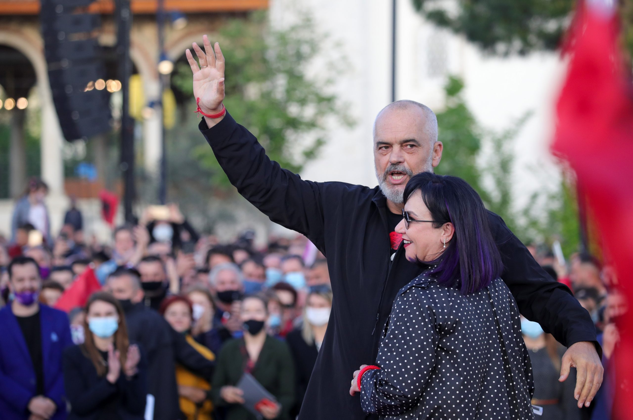 Albanian Prime Minister and leader of the Socialist Party Edi Rama and his wife Linda Rama attend a rally celebrating the party's election victory, at Skanderbeg Square in Tirana, Albania April 27, 2021. REUTERS/Florion Goga