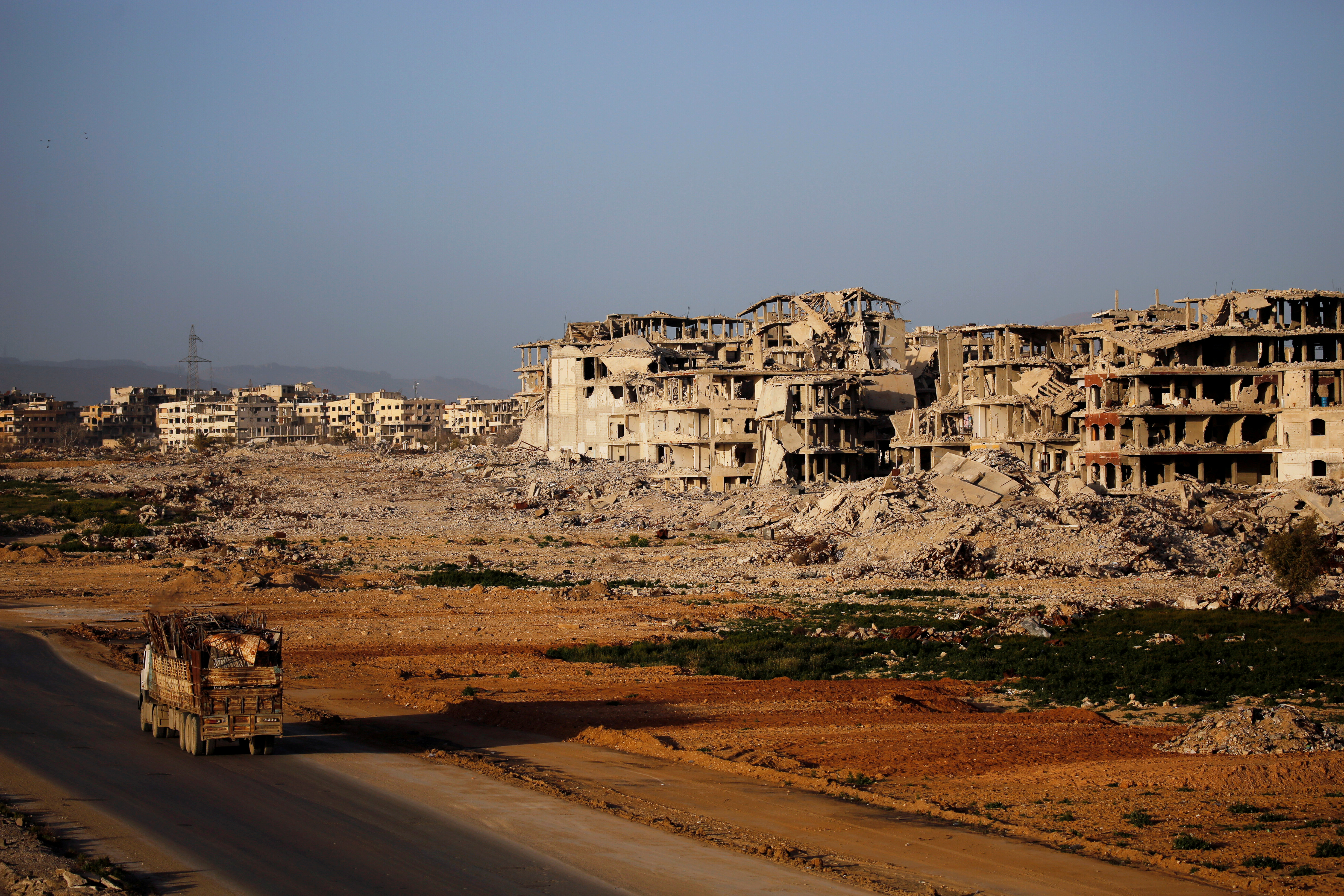 FILE PHOTO: A general view of damaged buildings in Ein Terma, a district of eastern Ghouta, Syria February 26, 2019. Picture taken February 26, 2019. REUTERS/Omar Sanadiki/File Photo
