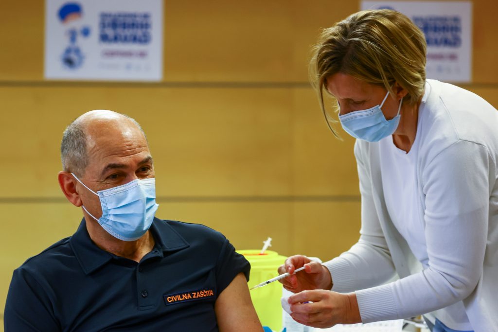 Slovenian Prime Minister Janez Jansa receives a dose of the AstraZeneca coronavirus disease (COVID-19) vaccine, in Ljubljana, Slovenia, March 19, 2021. REUTERS/Borut Zivulovic