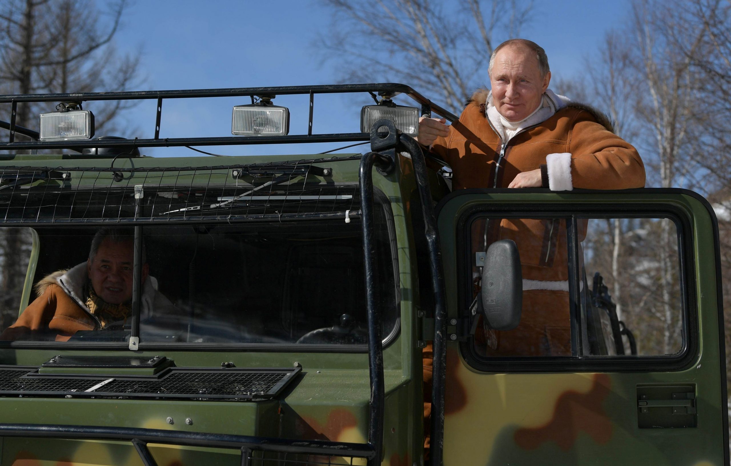 2021-03-21T123258Z_614090607_RC2OFM91EVIH_RTRMADP_3_RUSSIA-PUTIN-scaled.jpg