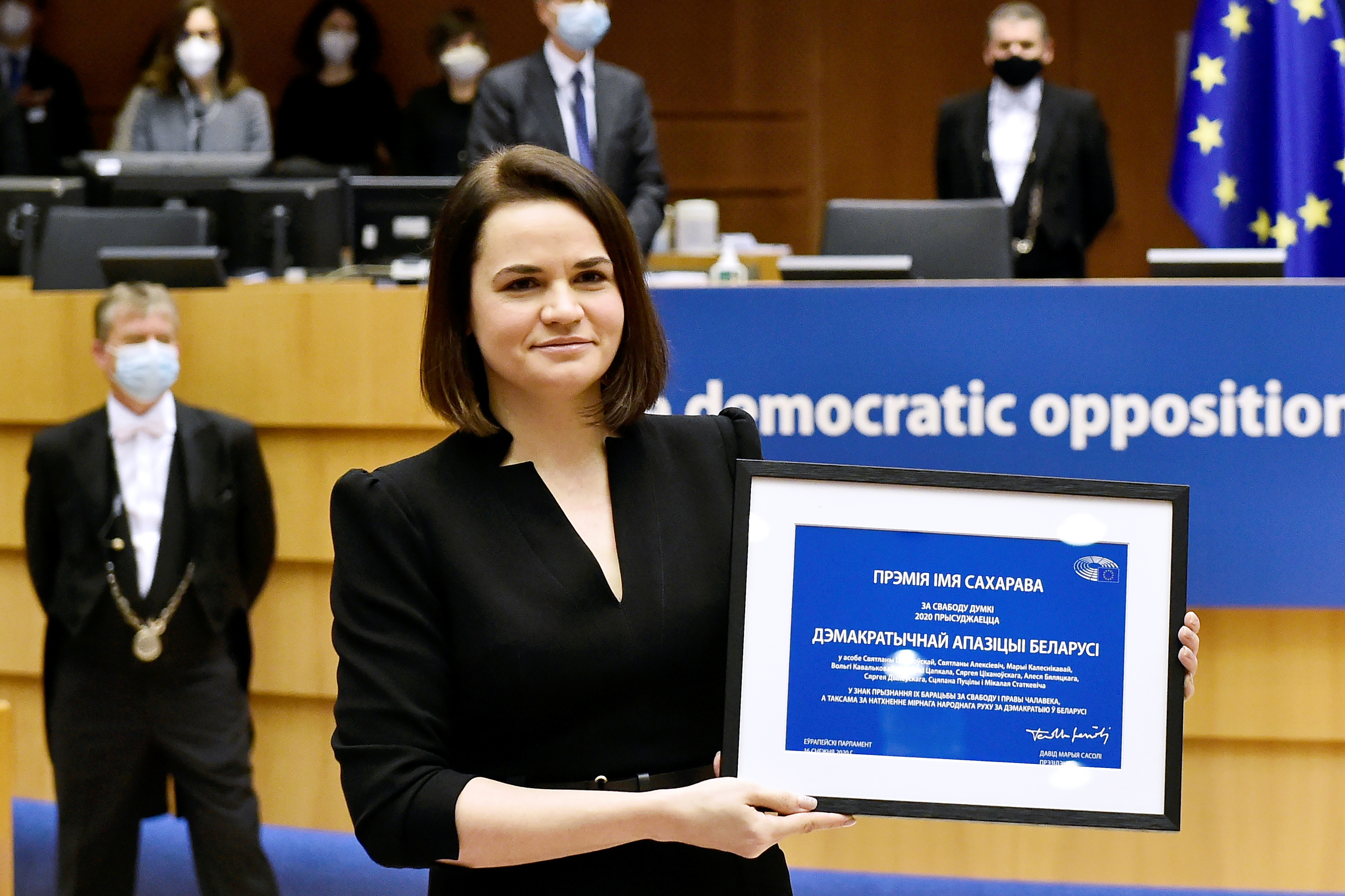 Svetlana Tihanovska
Belarus' opposition leader Sviatlana Tsikhanouskaya poses with the Sakharov Prize, European Union's annual human rights award, during a ceremony at the EU Parliament in Brussels, Belgium December 16, 2020.  John Thys/Pool via REUTERS
