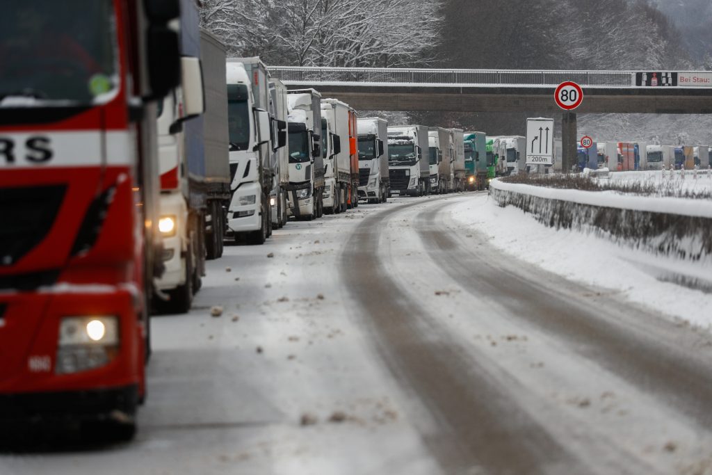 Trucks are seen stuck in traffic after heavy snowfall, in highway A7 near Fulda, Germany, February 8, 2021. REUTERS/Kai Pfaffenbach