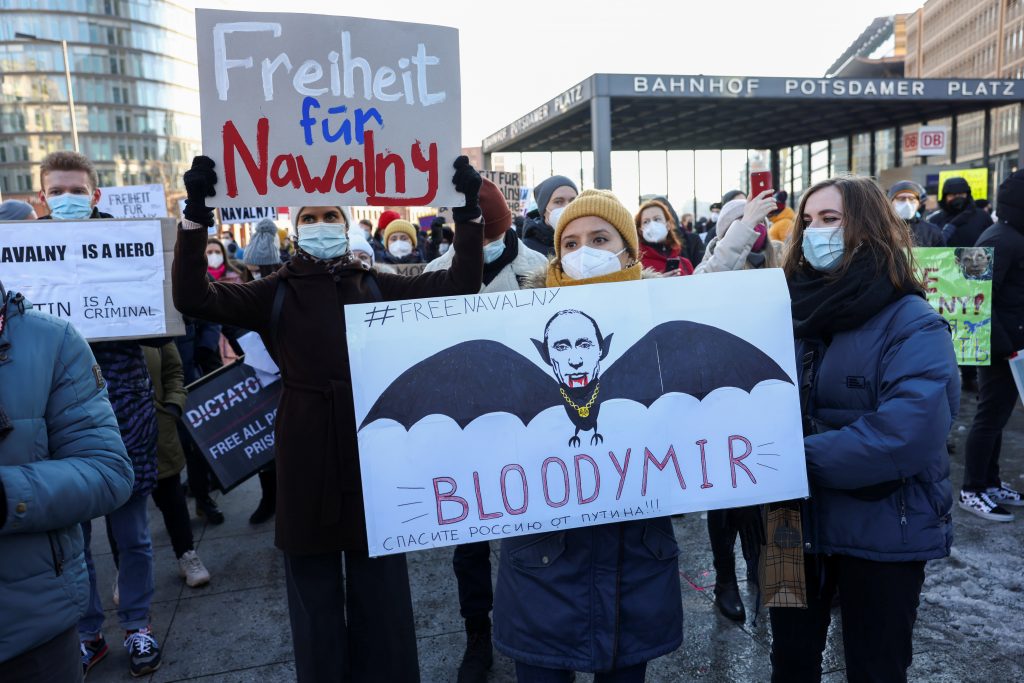 A person holds a placard reading "Freedom for Navalny" during a rally to demand the release of Russian opposition leader Alexei Navalny in Berlin, Germany January 31, 2021. REUTERS/Christian Mang