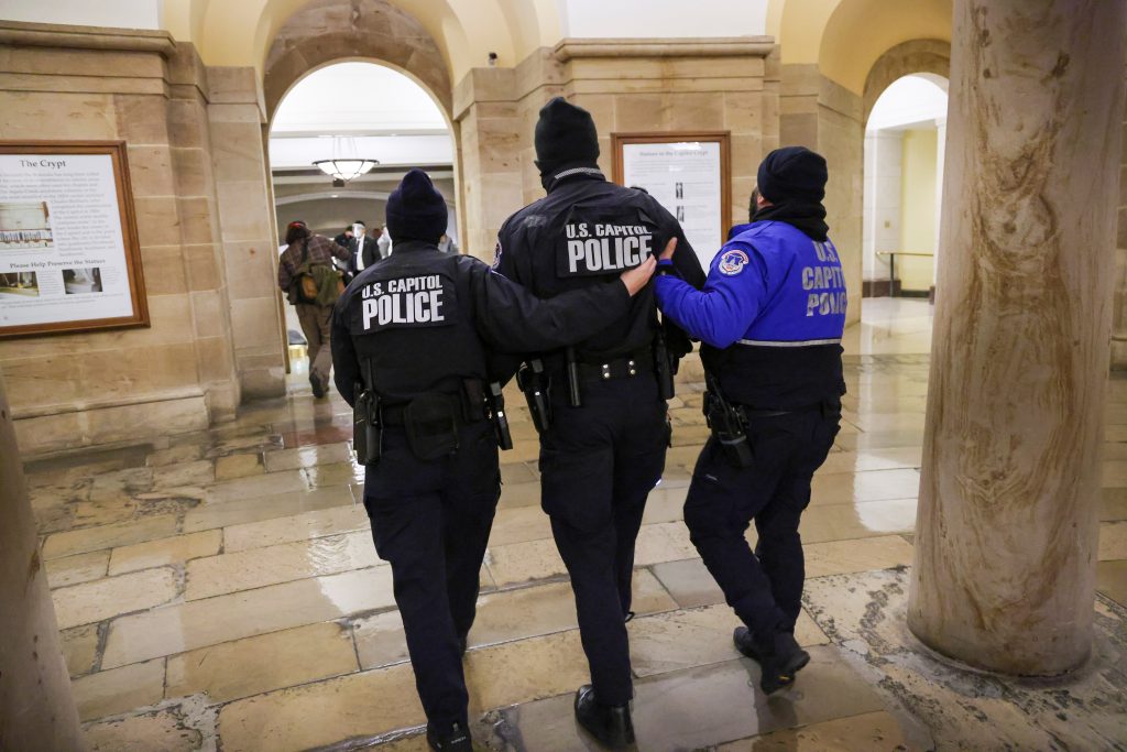 Members of the U.S. Capitol Police walk inside the Capitol as supporters of U.S. President Donald Trump protest outside, in Washington, U.S., January 6, 2021. REUTERS/Jonathan Ernst