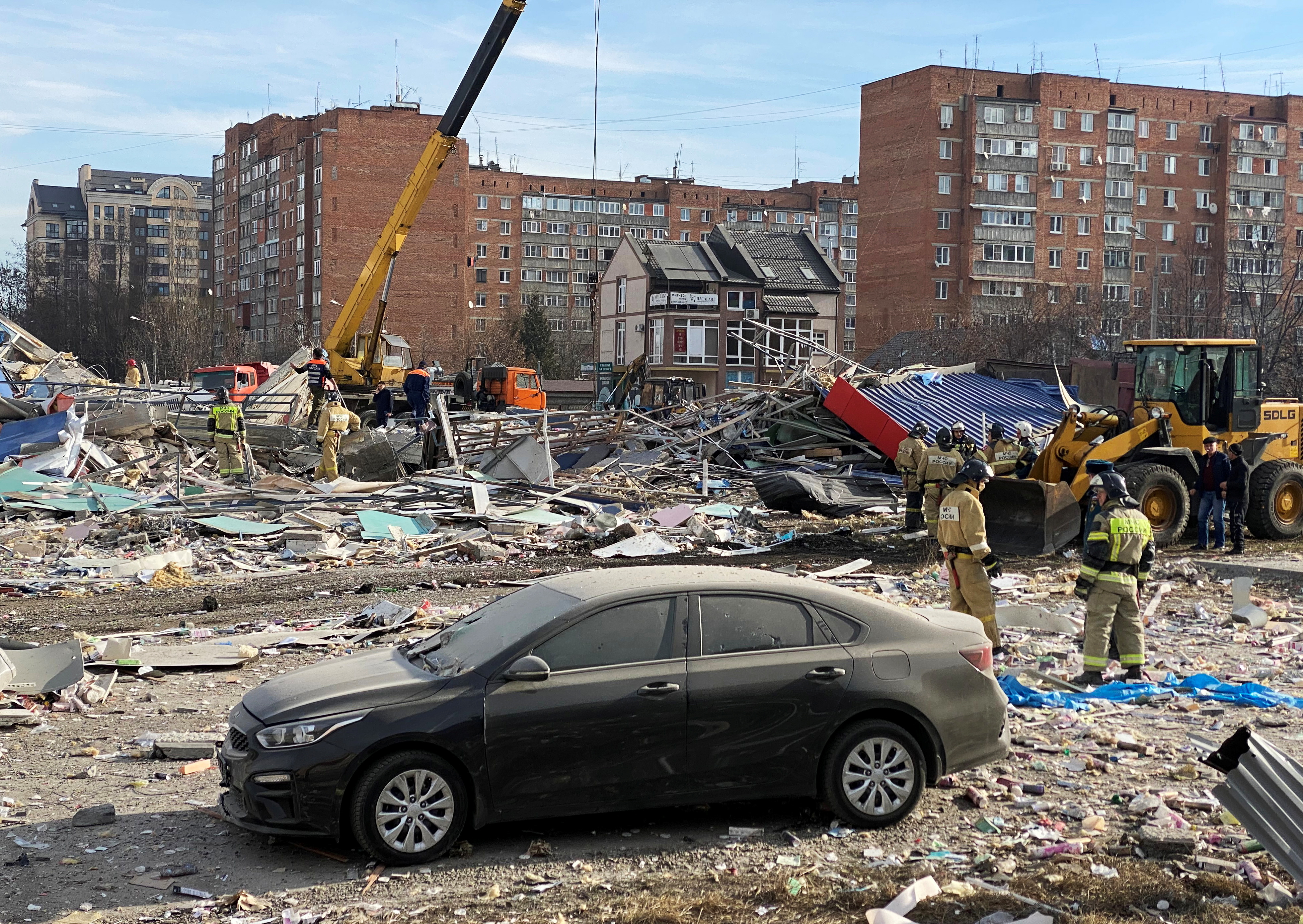 Members of emergency services work at the site of a collapsed building after an explosion in Vladikavkaz, Russia February 12, 2021. REUTERS/Kazbek Basayev