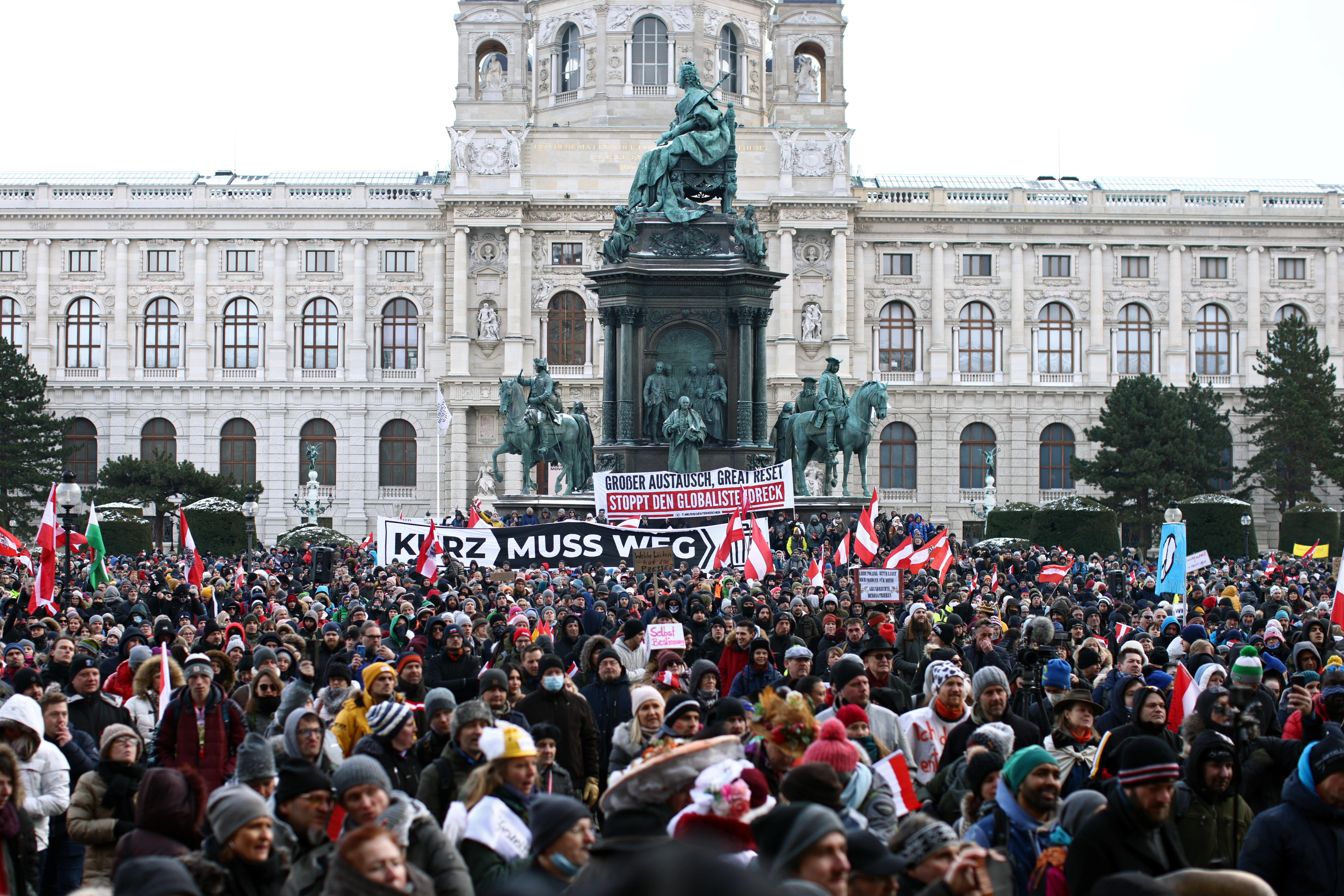 People gather at Maria Theresien Platz during a demonstration against the coronavirus disease (COVID-19) measures and their economic consequences in Vienna, Austria, January 16, 2021. REUTERS/Lisi Niesner