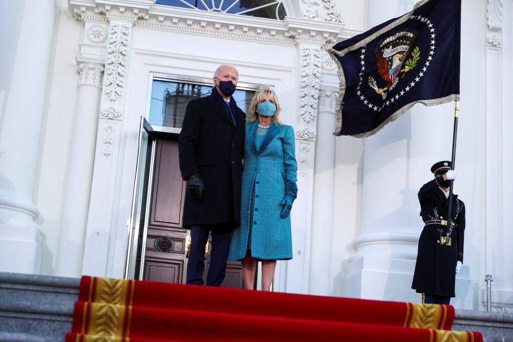 U.S. President Joe Biden and first lady Jill Biden stand at the North Portico of the White House, in Washington, U.S., January 20, 2021. REUTERS/Tom Brenner