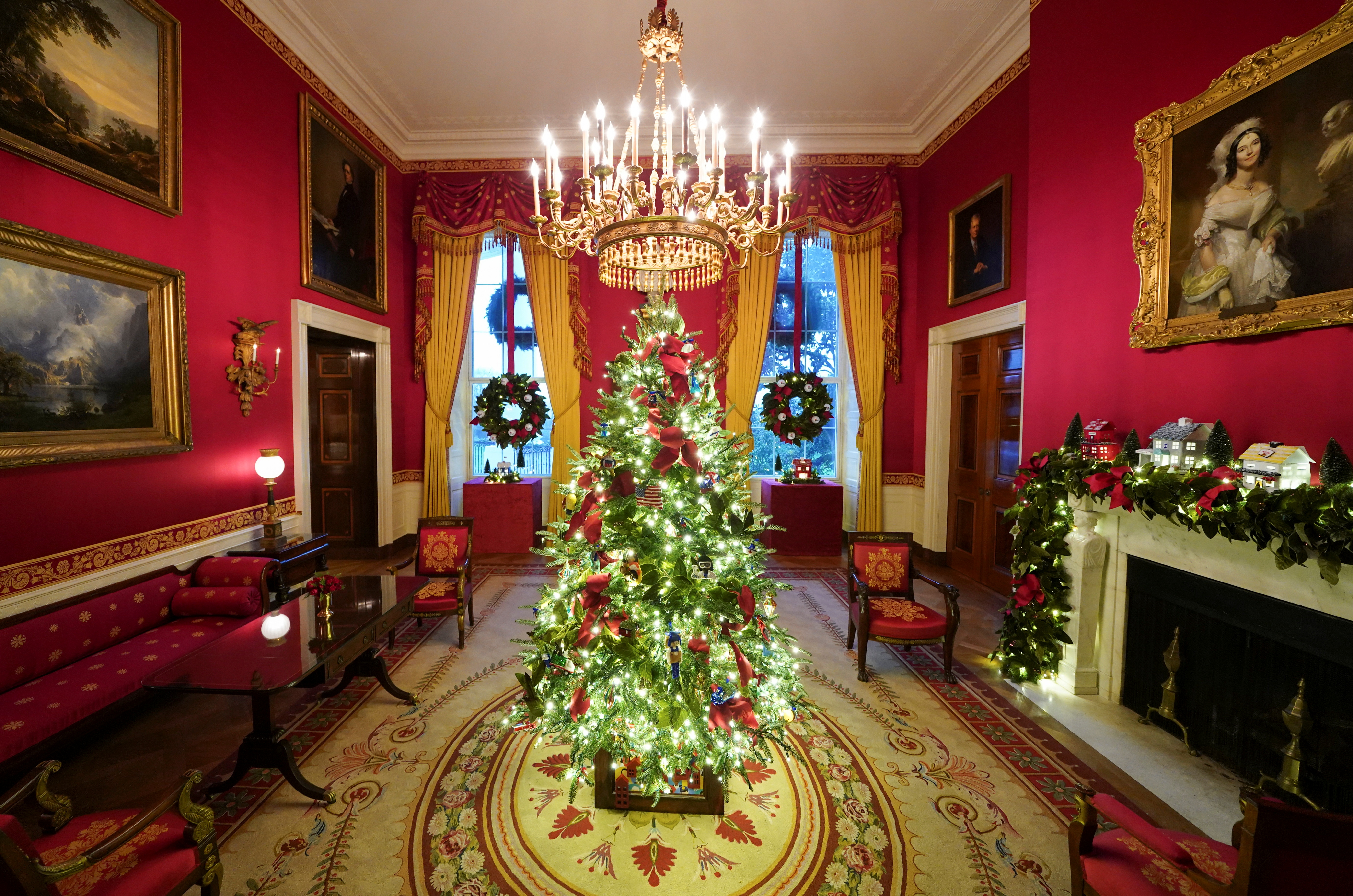 The Red Room of the White House is adorned with holiday decorations during a press preview in Washington, U.S., November 30, 2020.