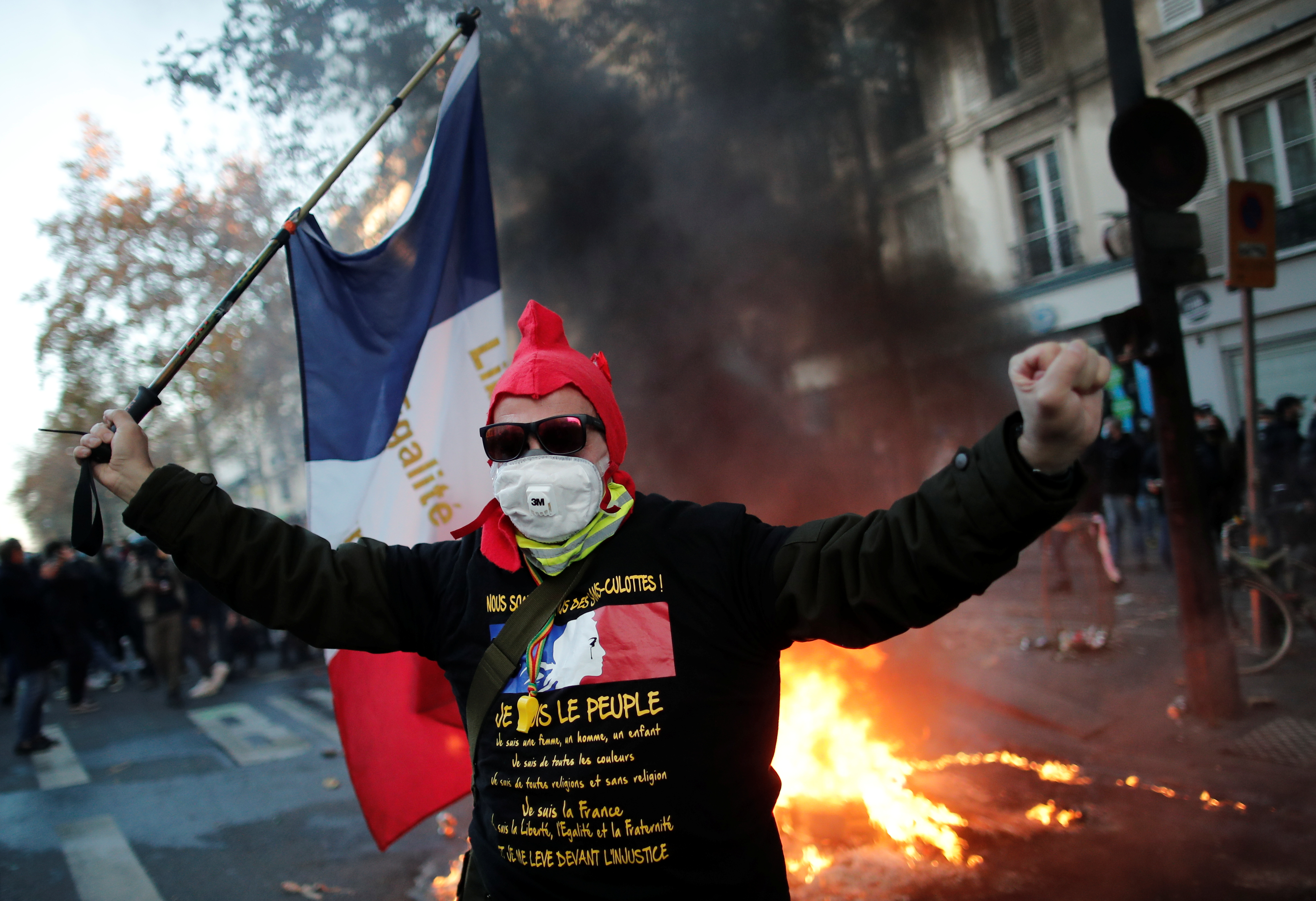 Protests over proposed curbs on identifying police, in Paris
