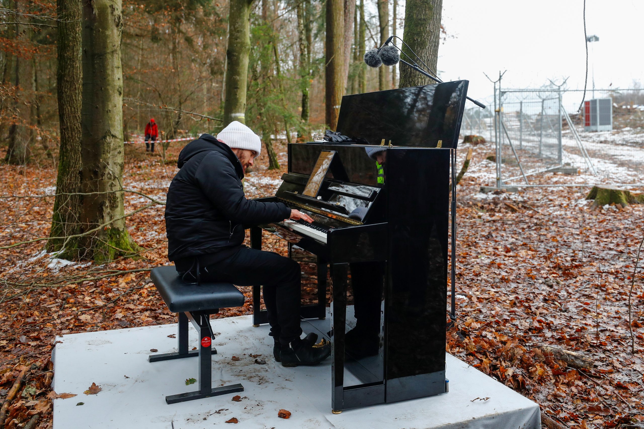 Pianist Igor Levit plays the piano during a protest action against the extension of the A49 motorway, near Dannenrod, Germany, December 4, 2020. REUTERS/Kai Pfaffenbach