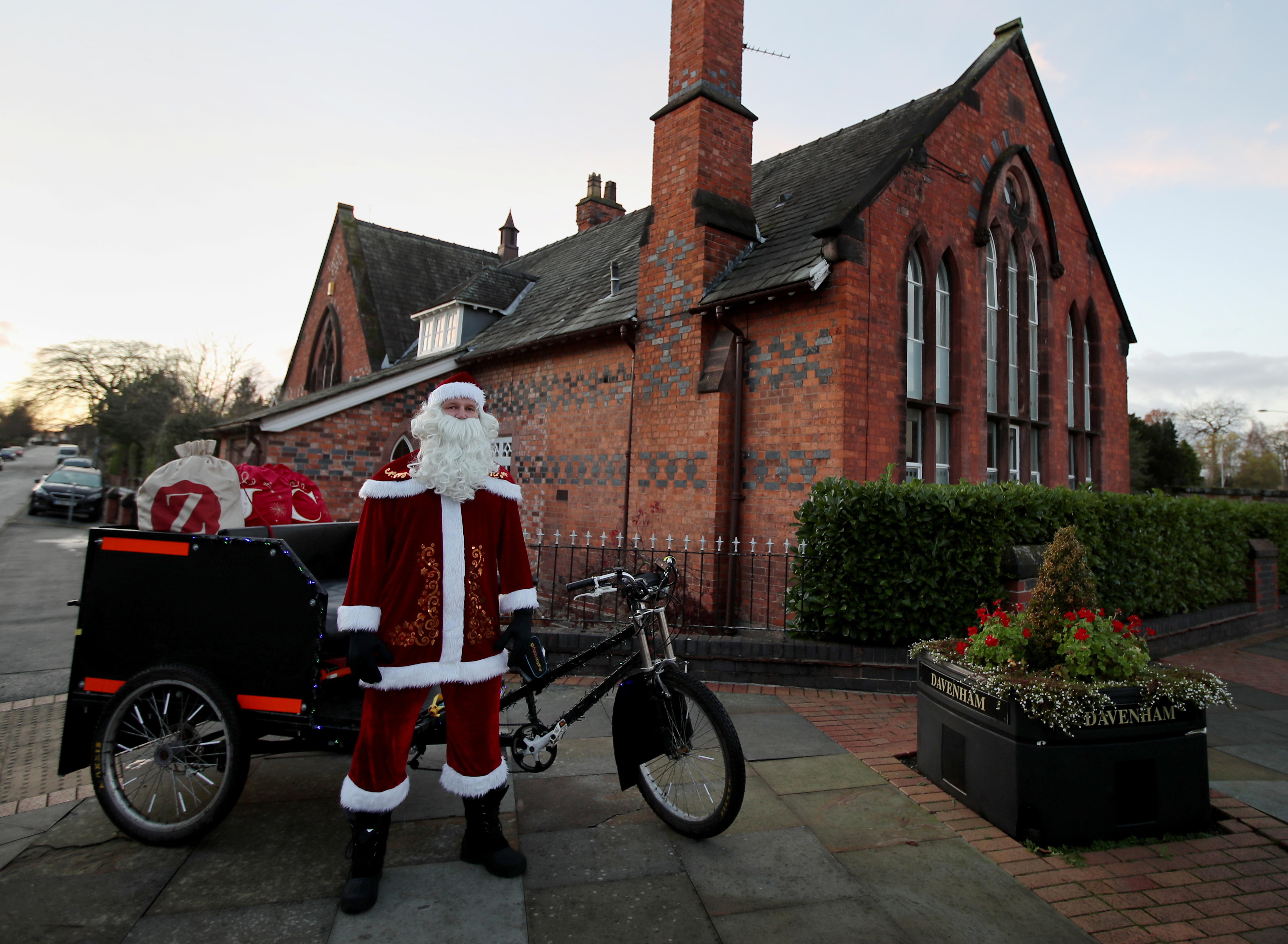 The Wider Image: Christmas wishes from Santas around the world