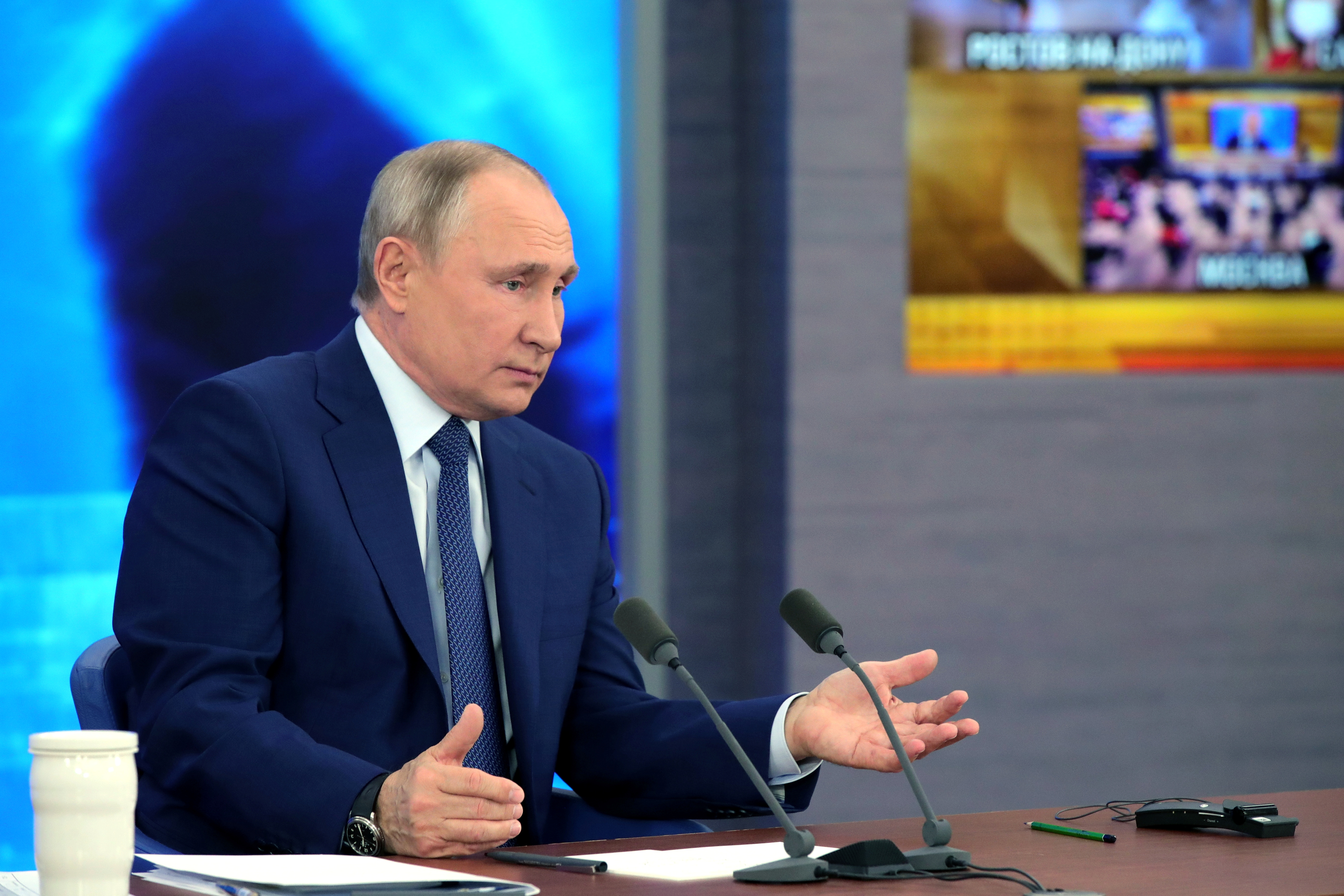 Russian President Vladimir Putin attends his annual end-of-year news conference outside Moscow