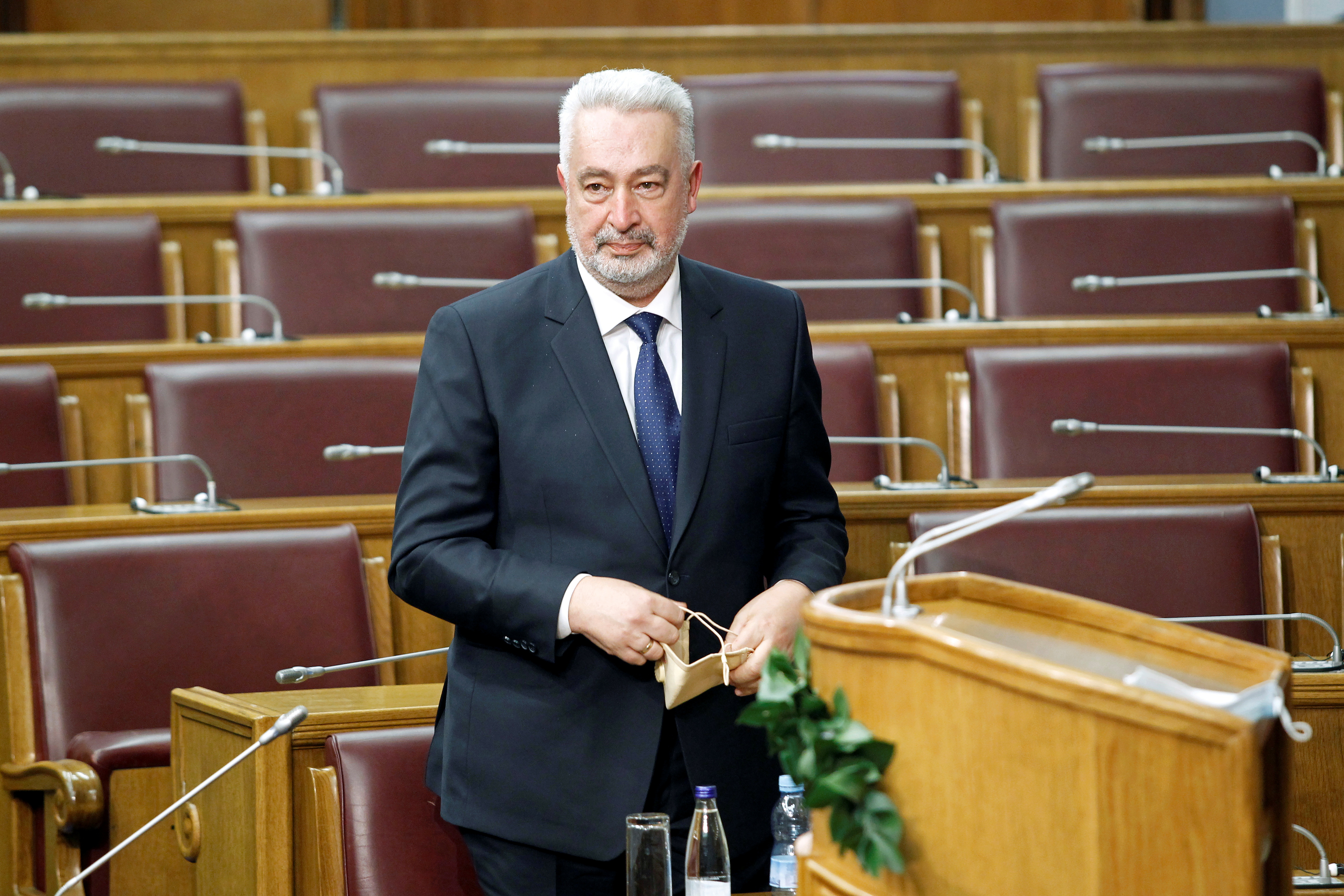 Montenegro's Prime Minister Zdravko Krivokapic wait for the members of his cabinet during the swearing-in ceremony for the new government at the parliament in Podgorica, Montenegro December 4, 2020. REUTERS/Stevo Vasiljevic