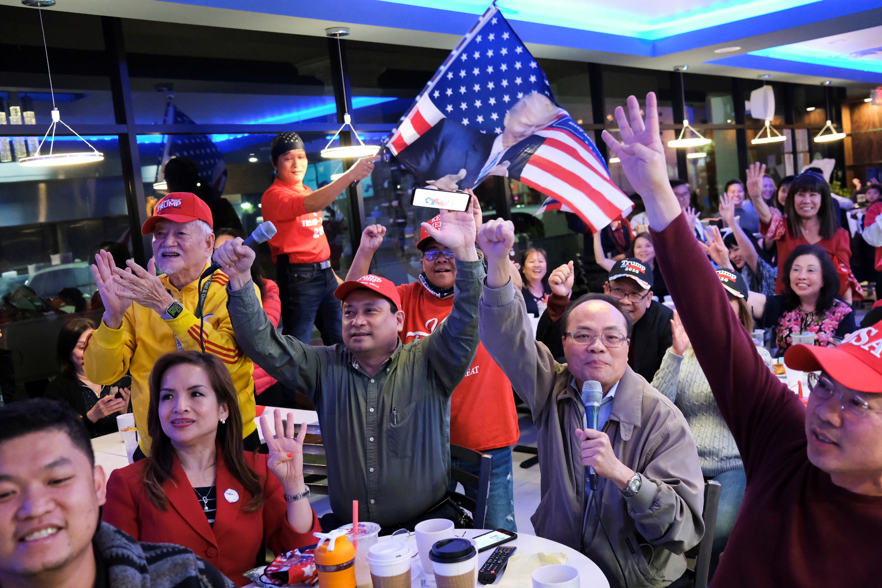 Vietnamese Americans supporters of U.S. President Donald Trump gather for an election watch party in Houston, Texas, U.S. November 3, 2020. REUTERS/Go Nakamura