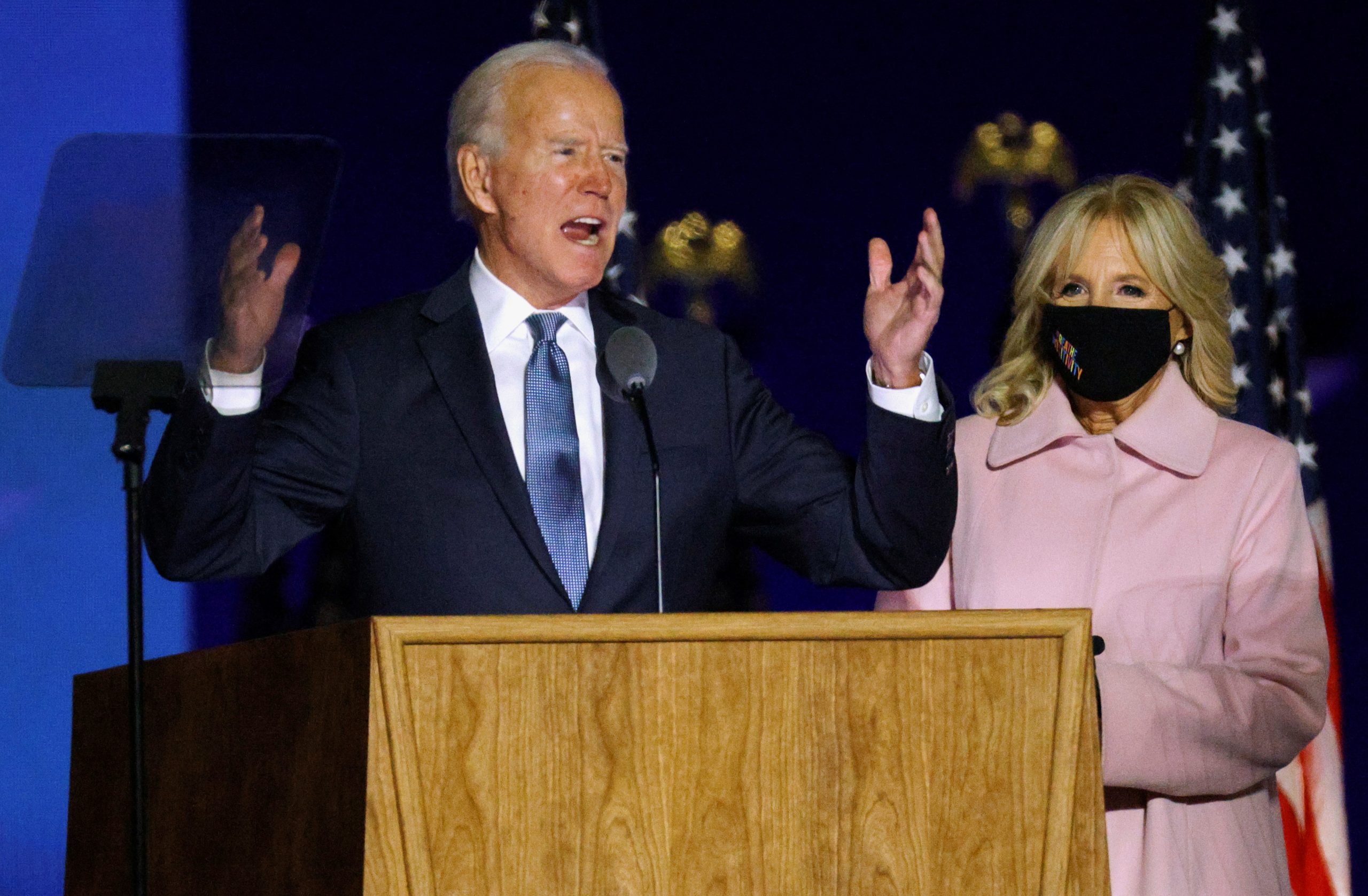 U.S. Democratic presidential nominee and former Vice President Joe Biden reacts to early results from the 2020 U.S. presidential election, next to his wife Jill in Wilmington, Delaware, U.S., November 4, 2020. REUTERS/Brian Snyder