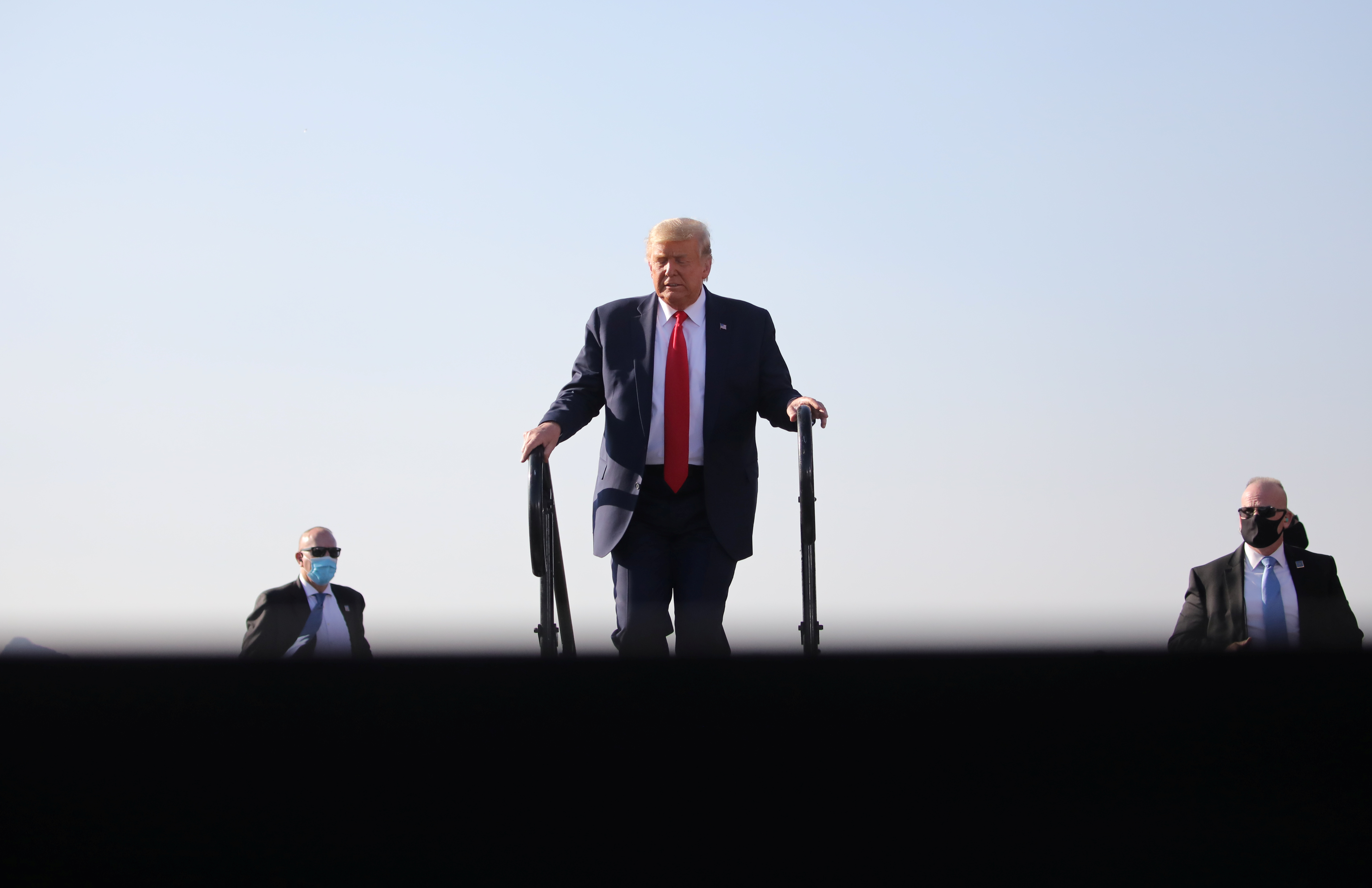 U.S. President Donald Trump arrives for a campaign event at Tucson International Airport in Tucson, Arizona, U.S., October 19, 2020.
