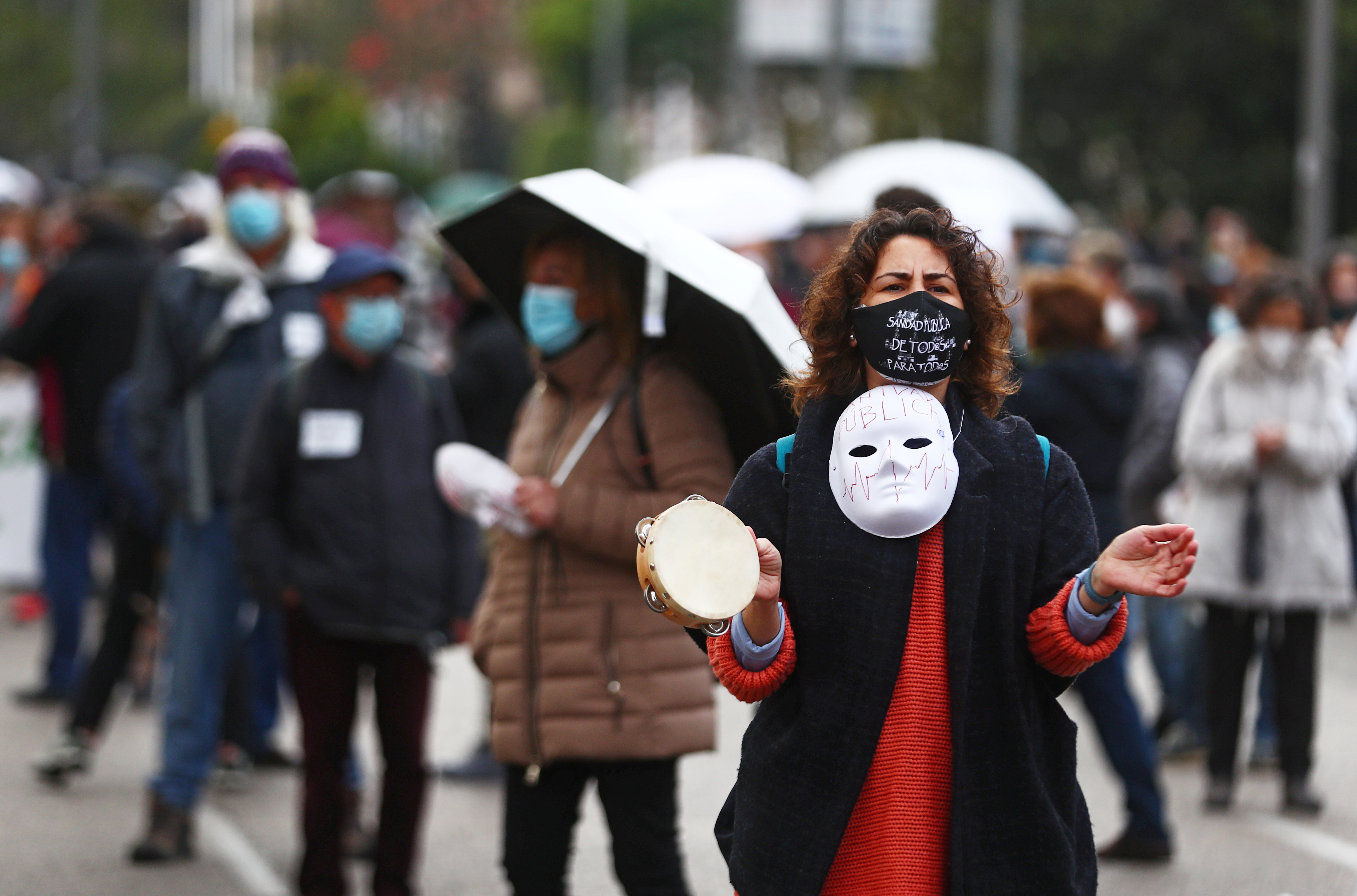 Protestors march in support of public health services amid the coronavirus disease (COVID-19) pandemic in Madrid, Spain, November 29, 2020. REUTERS/Javier Barbancho