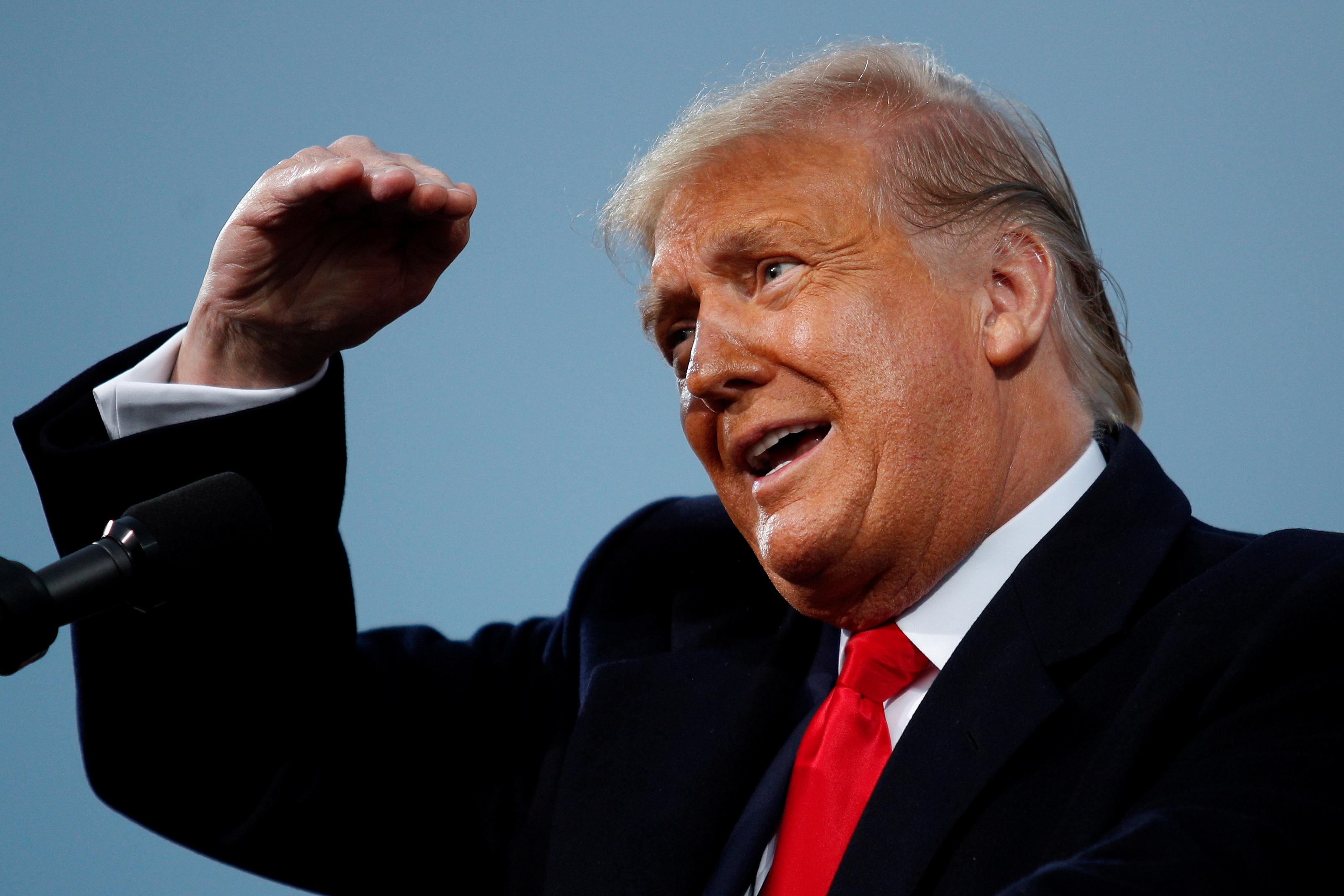 U.S. President Donald Trump gestures during a campaign event in Fayetteville, North Carolina, U.S., September 19, 2020. REUTERS/Tom Brenner REFILE - CORRECTING STATE
