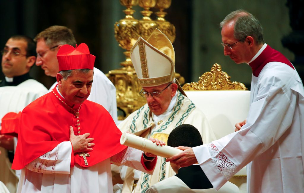 FILE PHOTO: New cardinal Giovanni Angelo Becciu of Italy is seen during a consistory ceremony to install 14 new cardinals in Saint Peter's Basilica at the Vatican, June 28 2018. REUTERS/Tony Gentile/File Photo